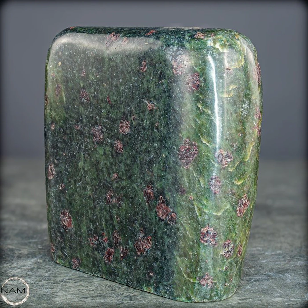 Natural almandine garnet in a green matrix – Powerful...