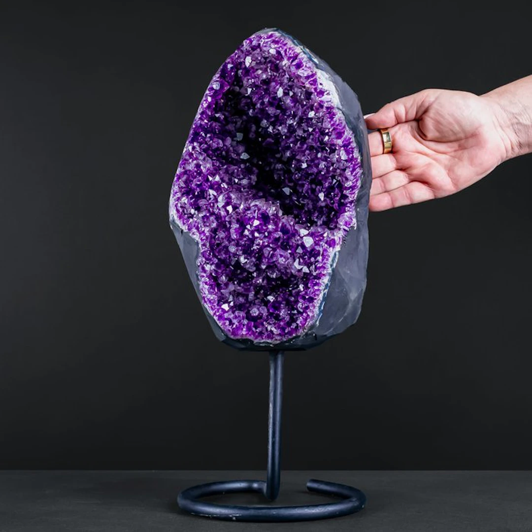Stunning amethyst on a stand — majestic crystal energy in an elegant display