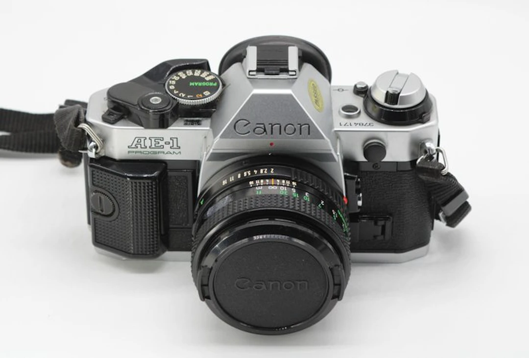 Canon AE-1 Program + 50mm f/2 Single lens reflex camera (SLR)