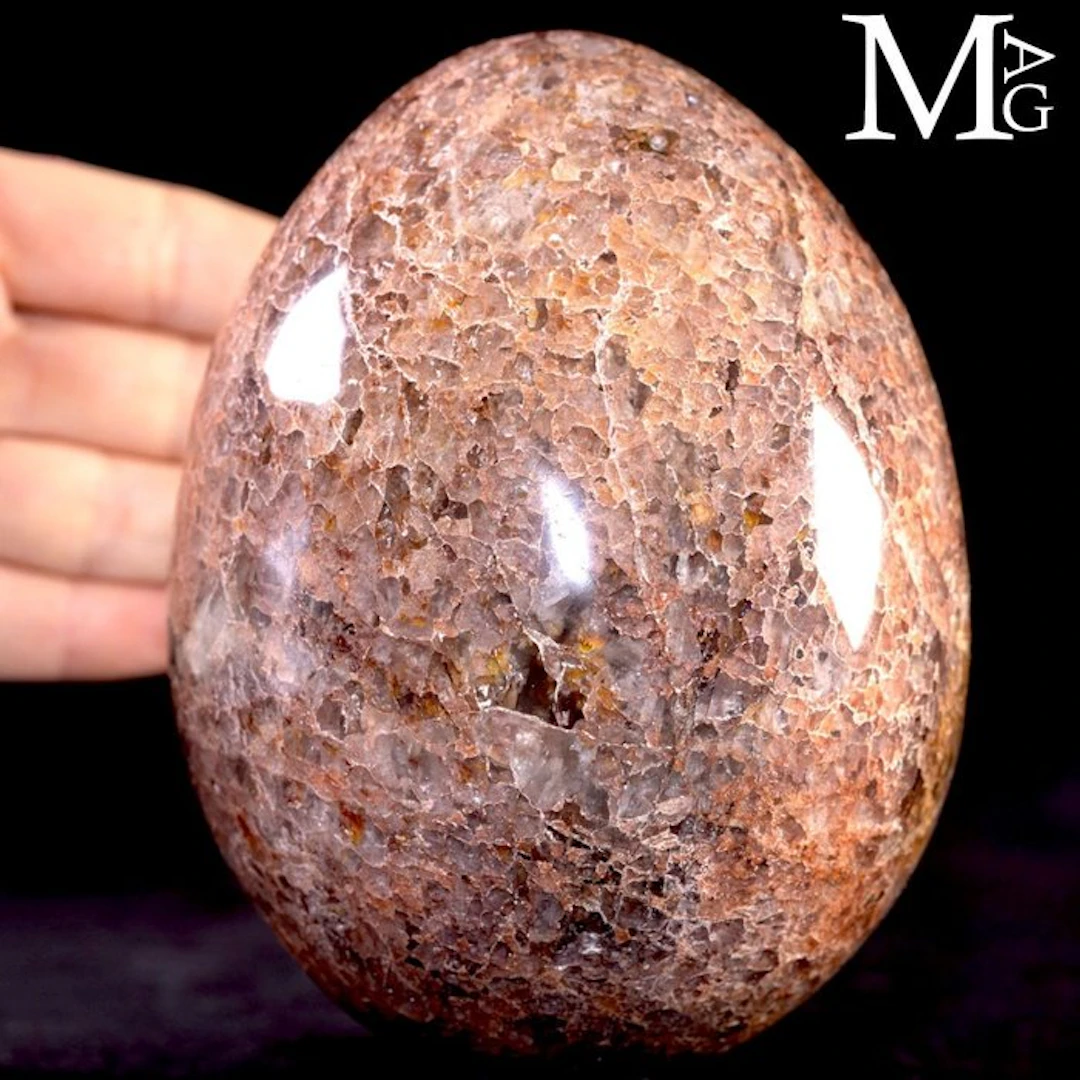 Carved Madagascan Rose Quartzite Egg - Symbolizing life...