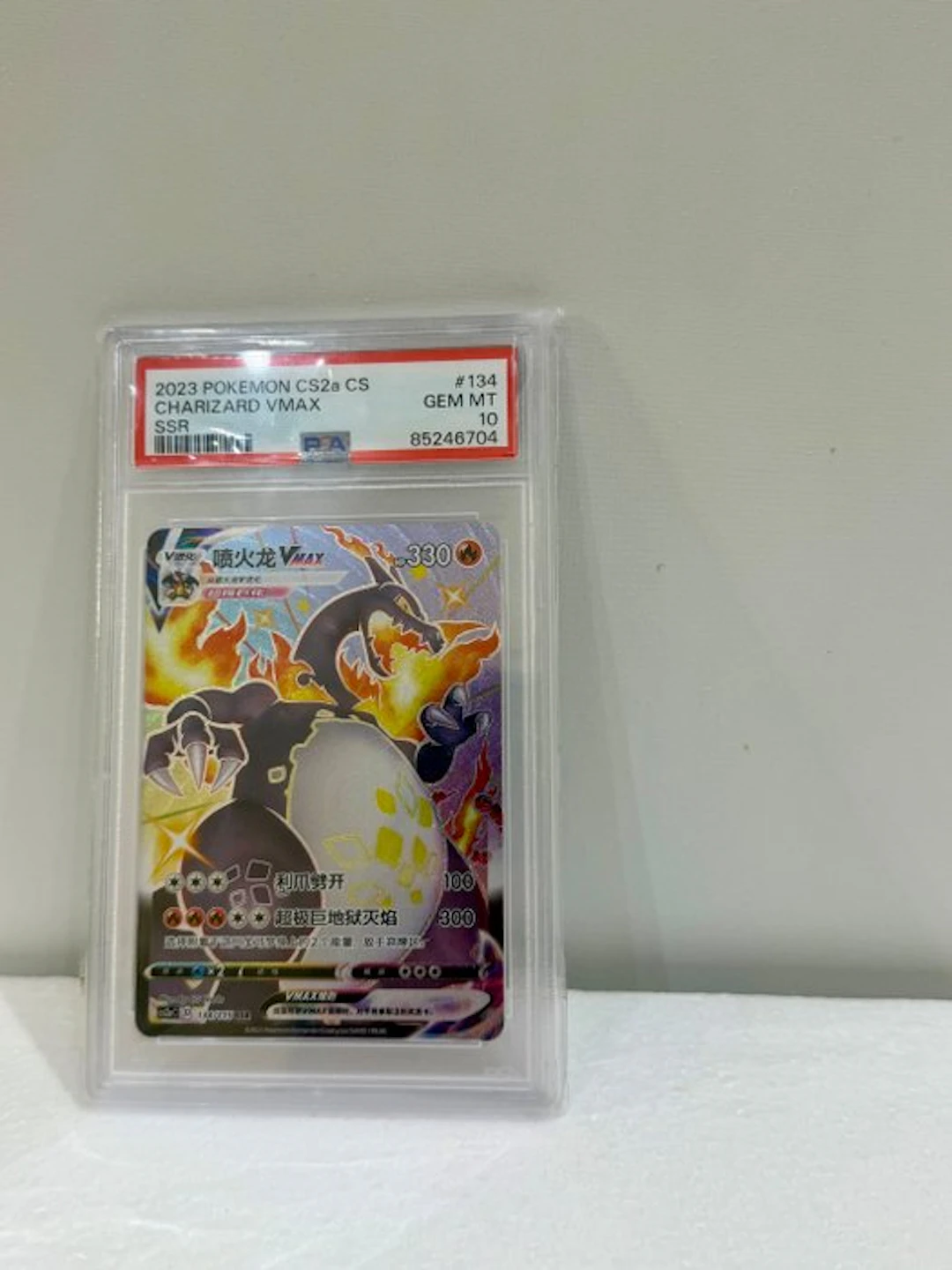 Pokémon - 1 Graded card - Charizard 134/115 Foil