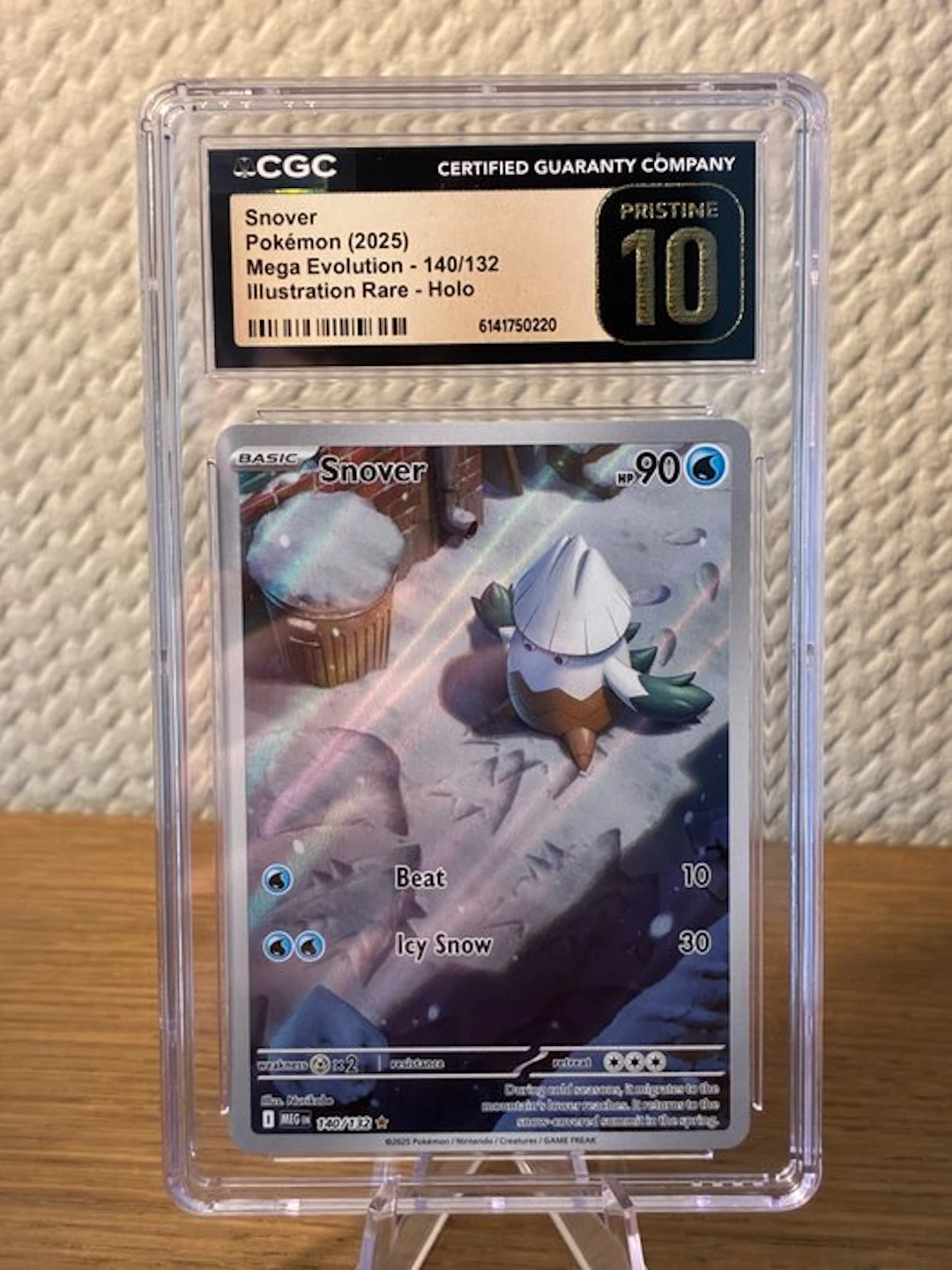 Pokémon - 1 Graded card - Snover 140/132 Foil