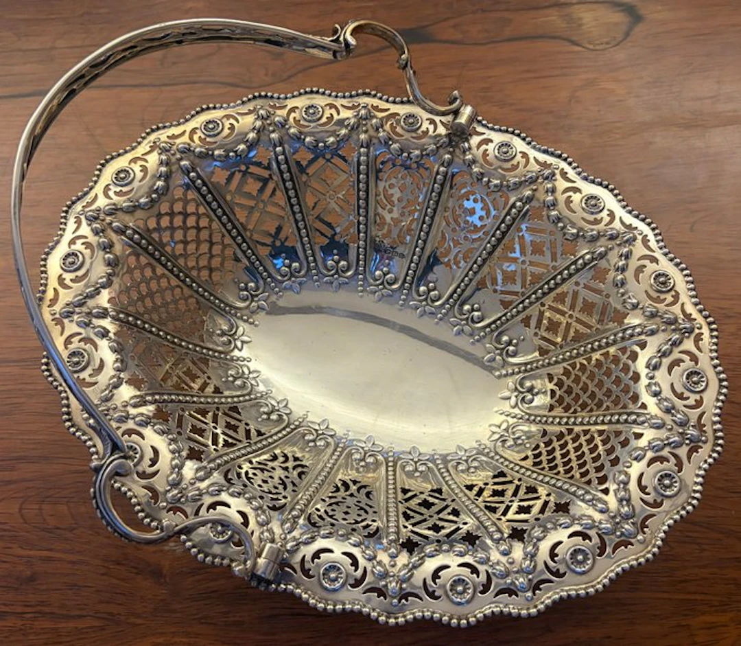 West & Son - Fruit basket - .925 silver - with a tilting handle