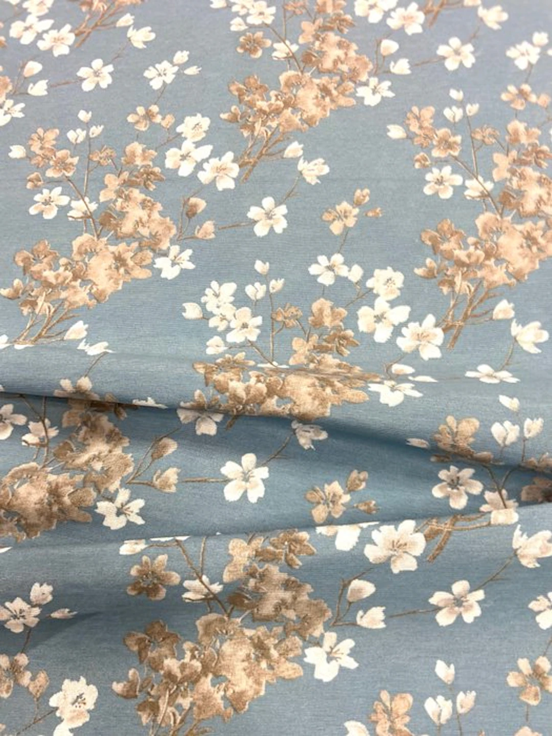 1561★ Refined fabric with flowers on a powder blue...