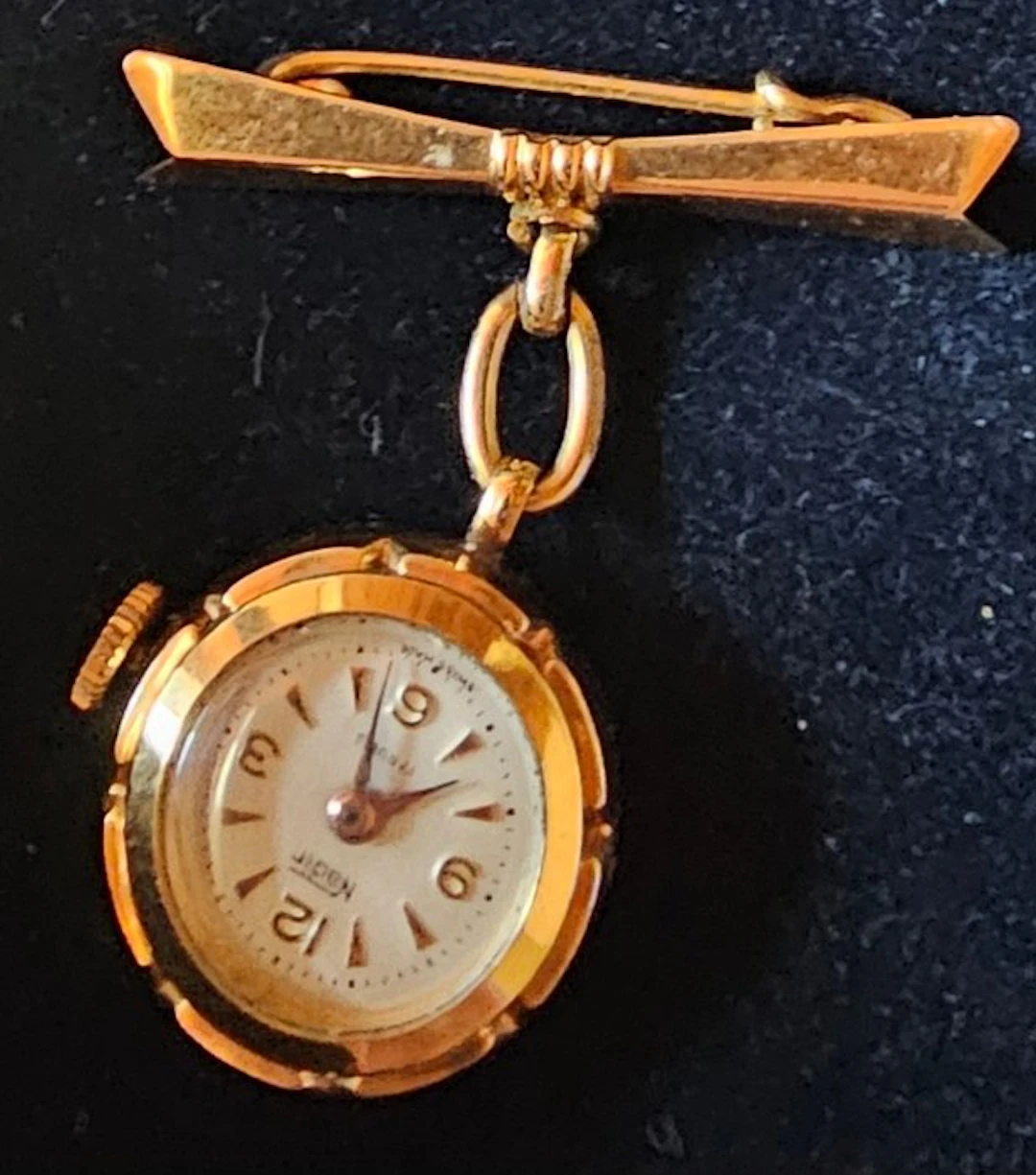 Nadir - spilla con orologio pendente