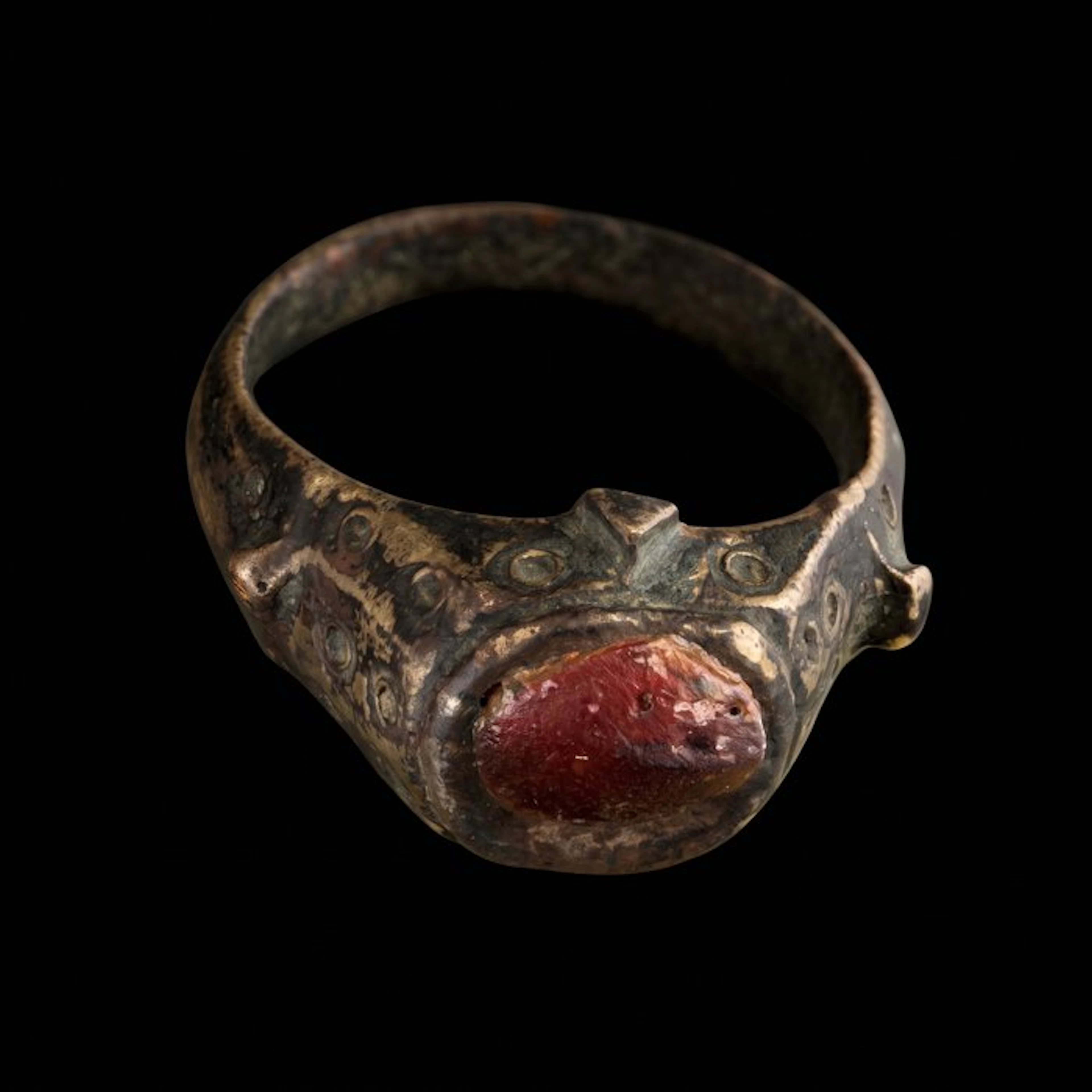 Medieval Bronze Red Central Stone and Decorated ring (No reserve price)