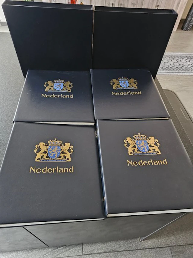 Netherlands - 4 deluxe padded DAVO albums, Netherlands, with stamps