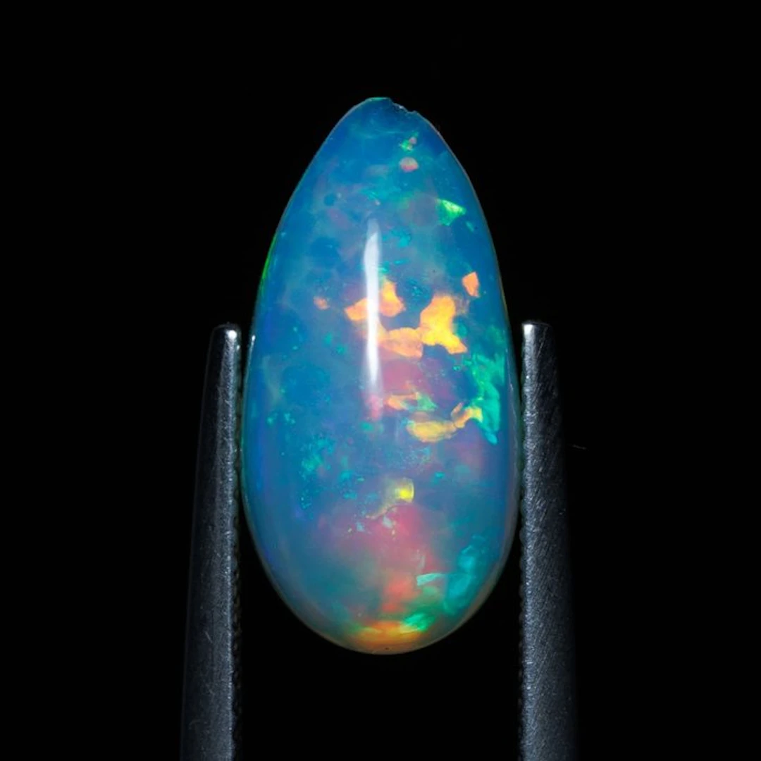 1 pcs Orange Opal - 3.75 ct - International Gemological...