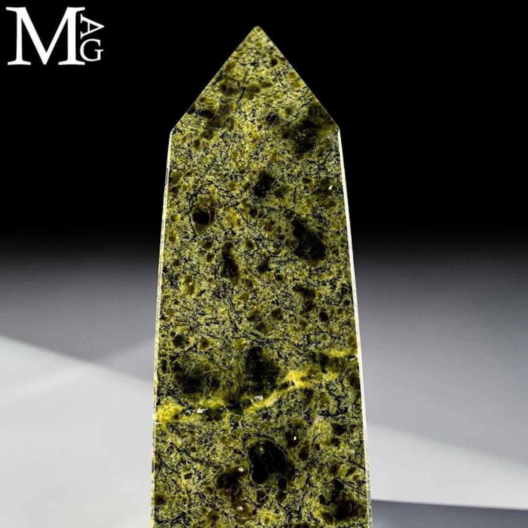 High-quality obelisk carved from serpentine from the Ural...