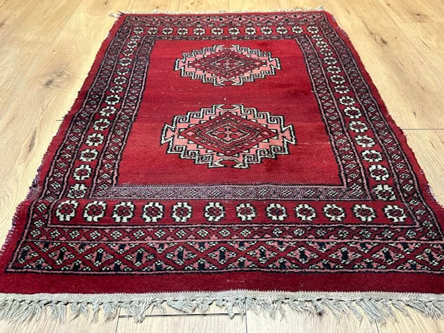 Hand-knotted Bukhara rug – geometric double medallions...
