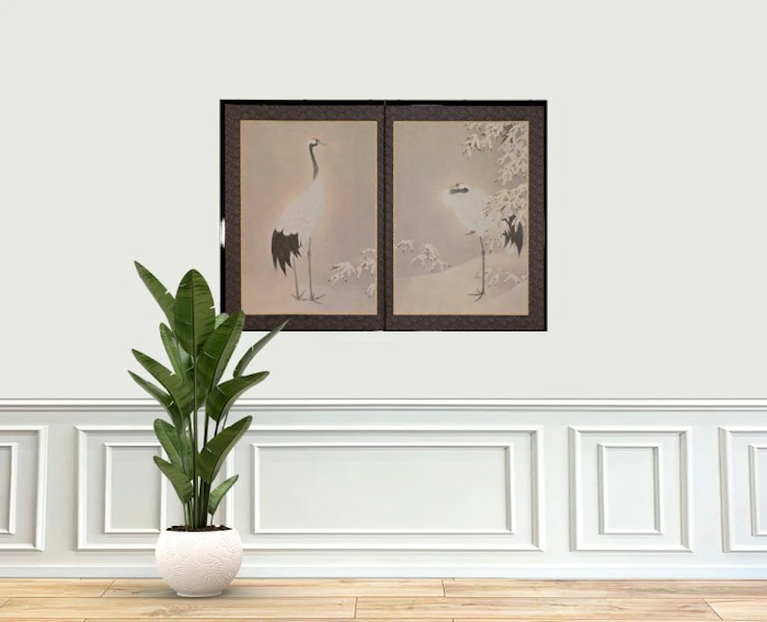 A lovely two panel screen with cranes in a snowy landscape - Paper