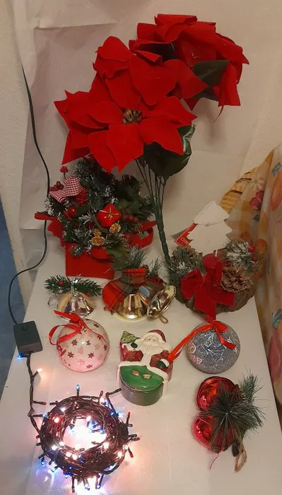 Themed collection - Christmas decorations and a straw doll.