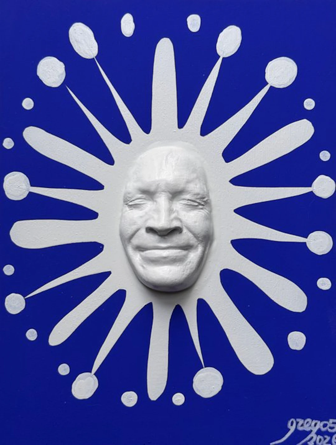 gregos - White smiling splash on blue background