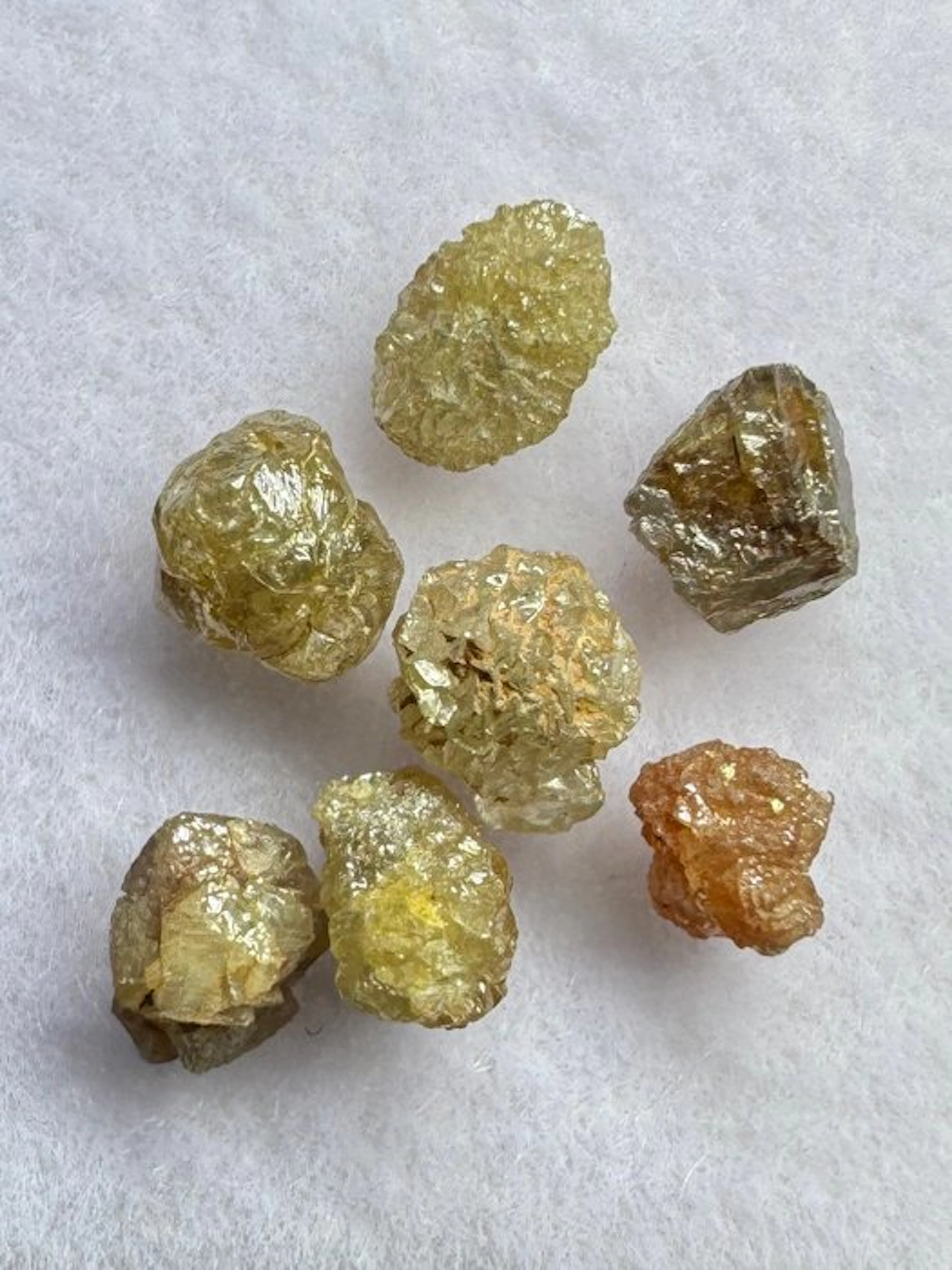 Lot of 7 rough orange-red diamonds