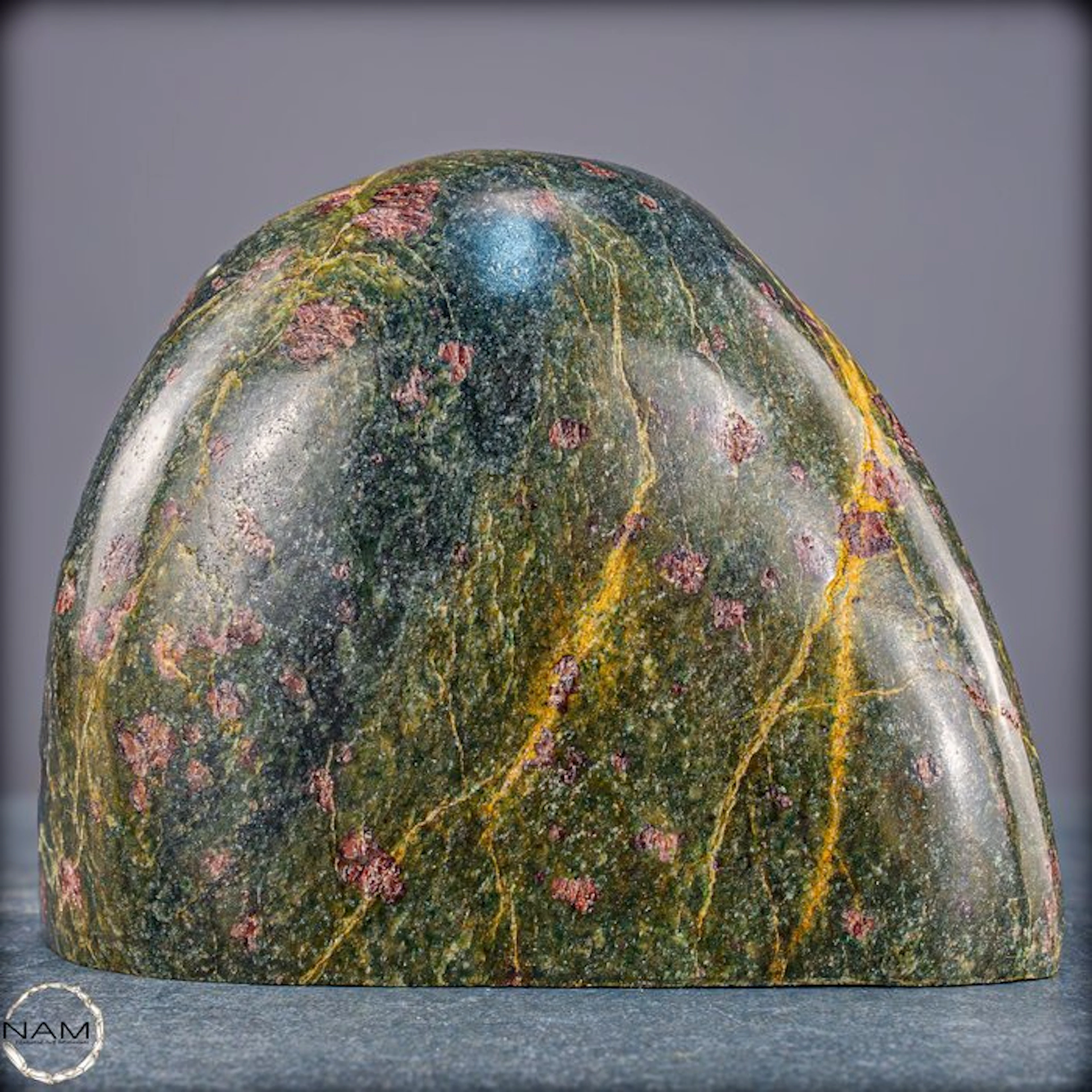 Natural almandine garnet in a green matrix – Powerful...