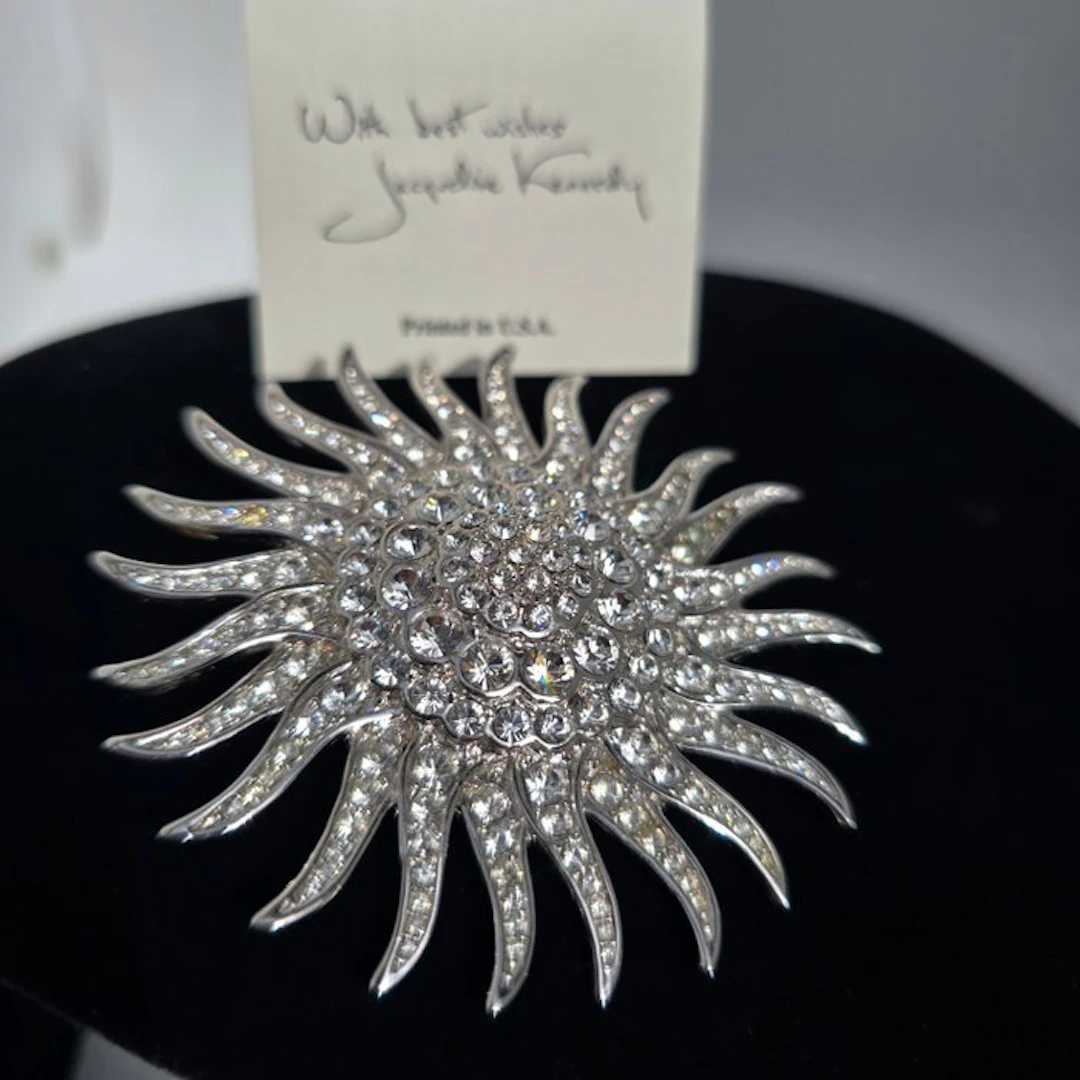 Camrose & Kross - Jackie's "Sunburst" crystal worn at the state dinner in 1960s