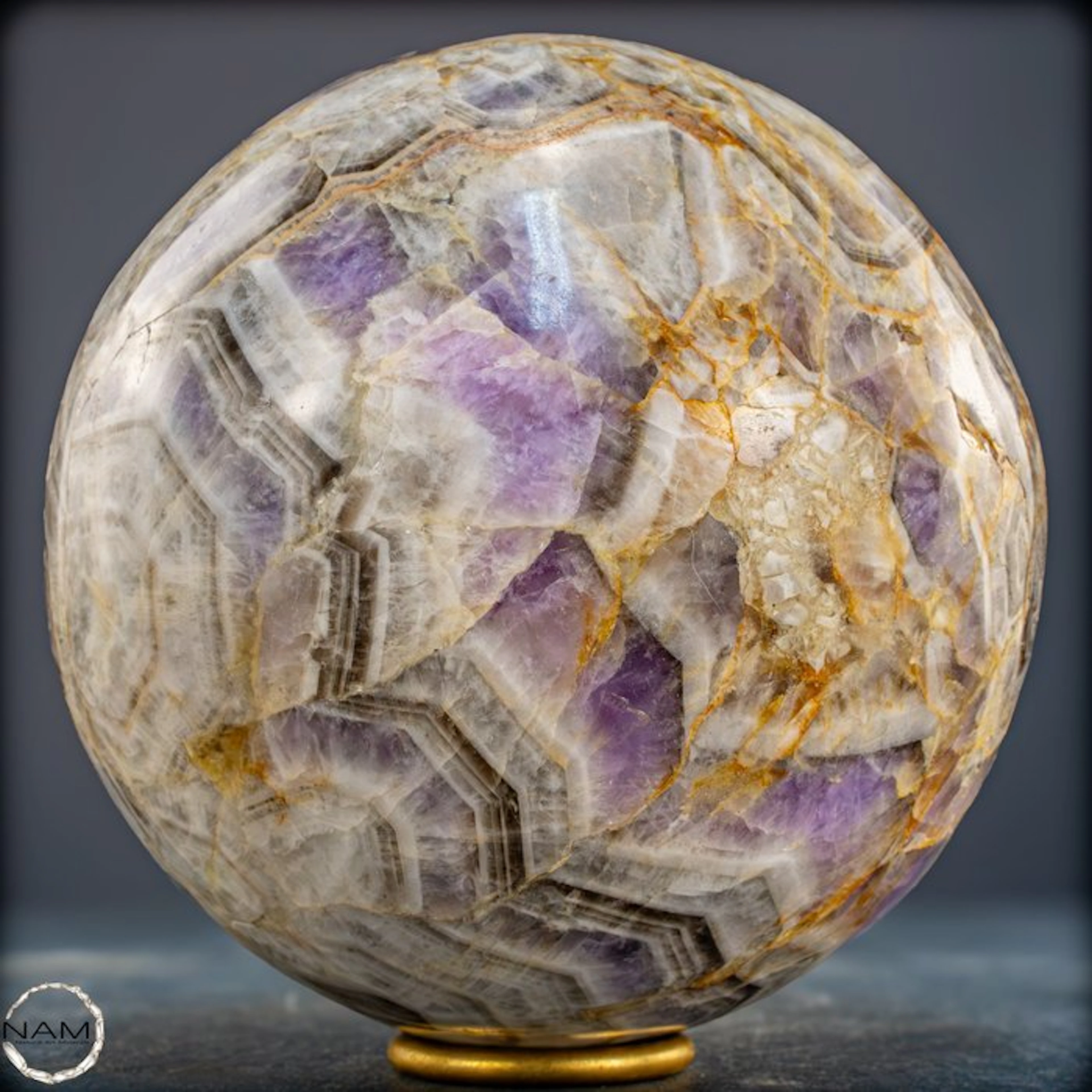 Natural Chevron Amethyst Sphere – bold purple drawing...