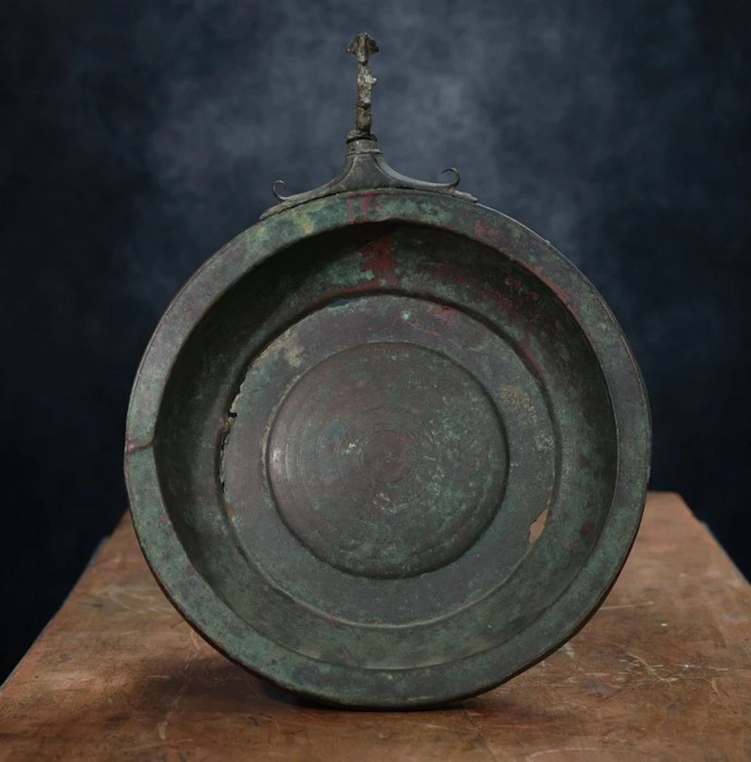 Ancient Roman hook bronze bowl offering engraved with concentric circles