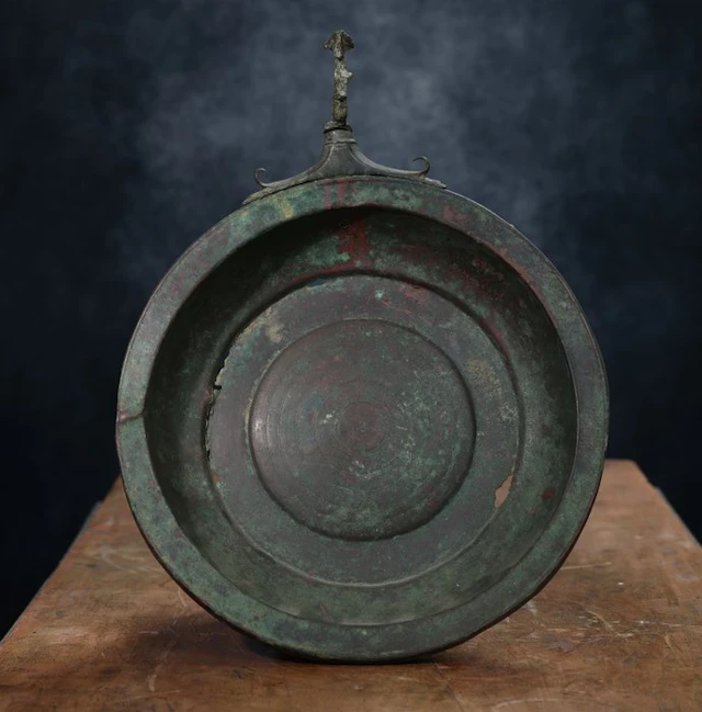 Ancient Roman hook bronze bowl offering engraved with concentric circles