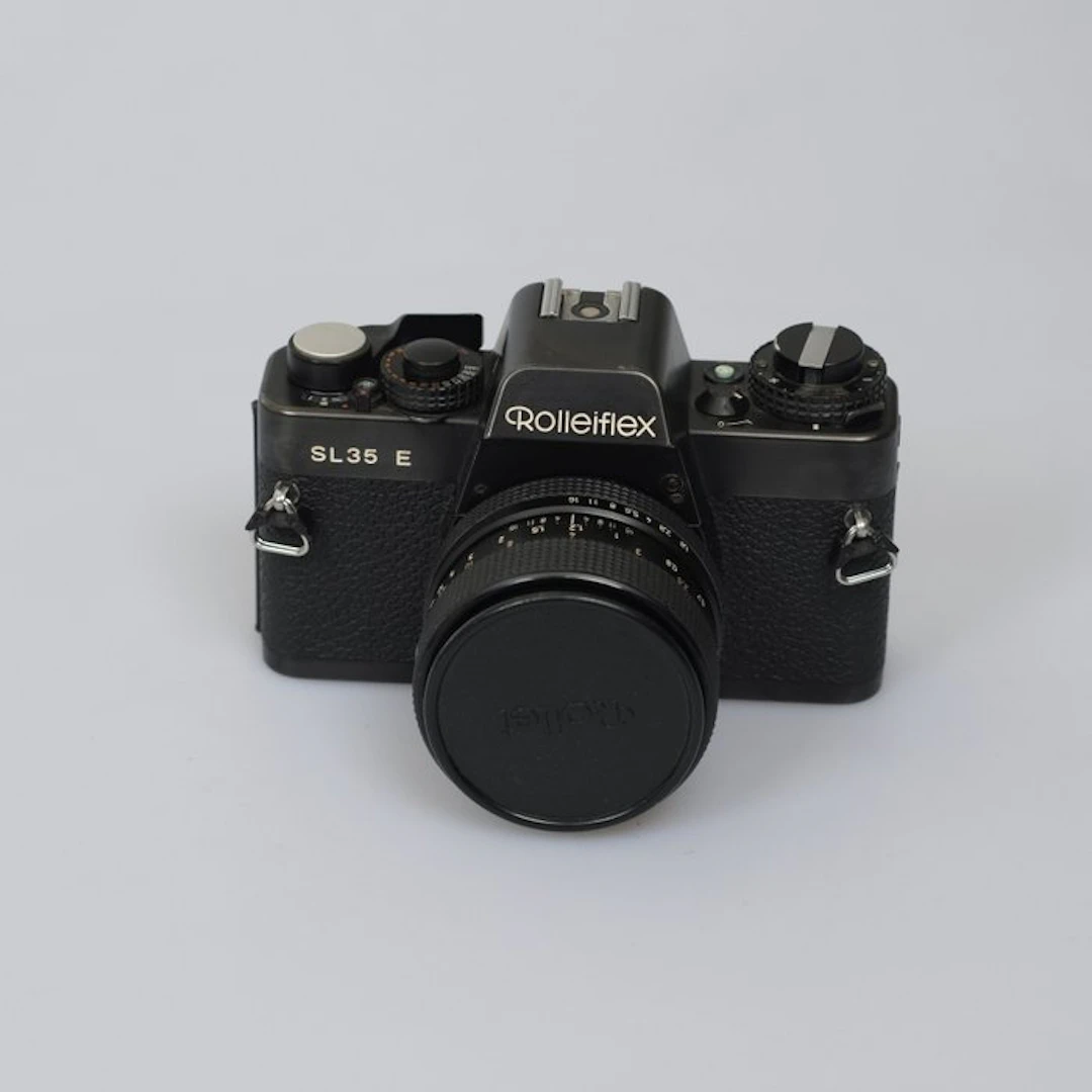Rollei SL35 E + Planar 1.8/50mm Single lens reflex camera (SLR)