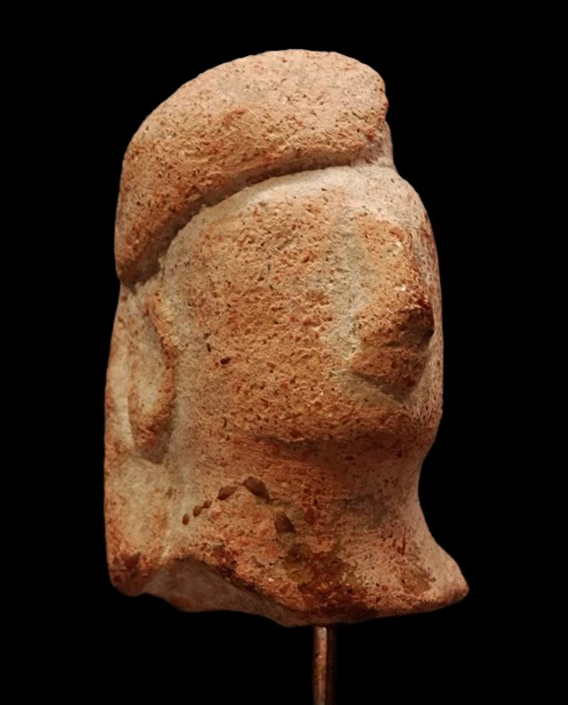 Cypriot Terracotta - Head of a young man wearing a...