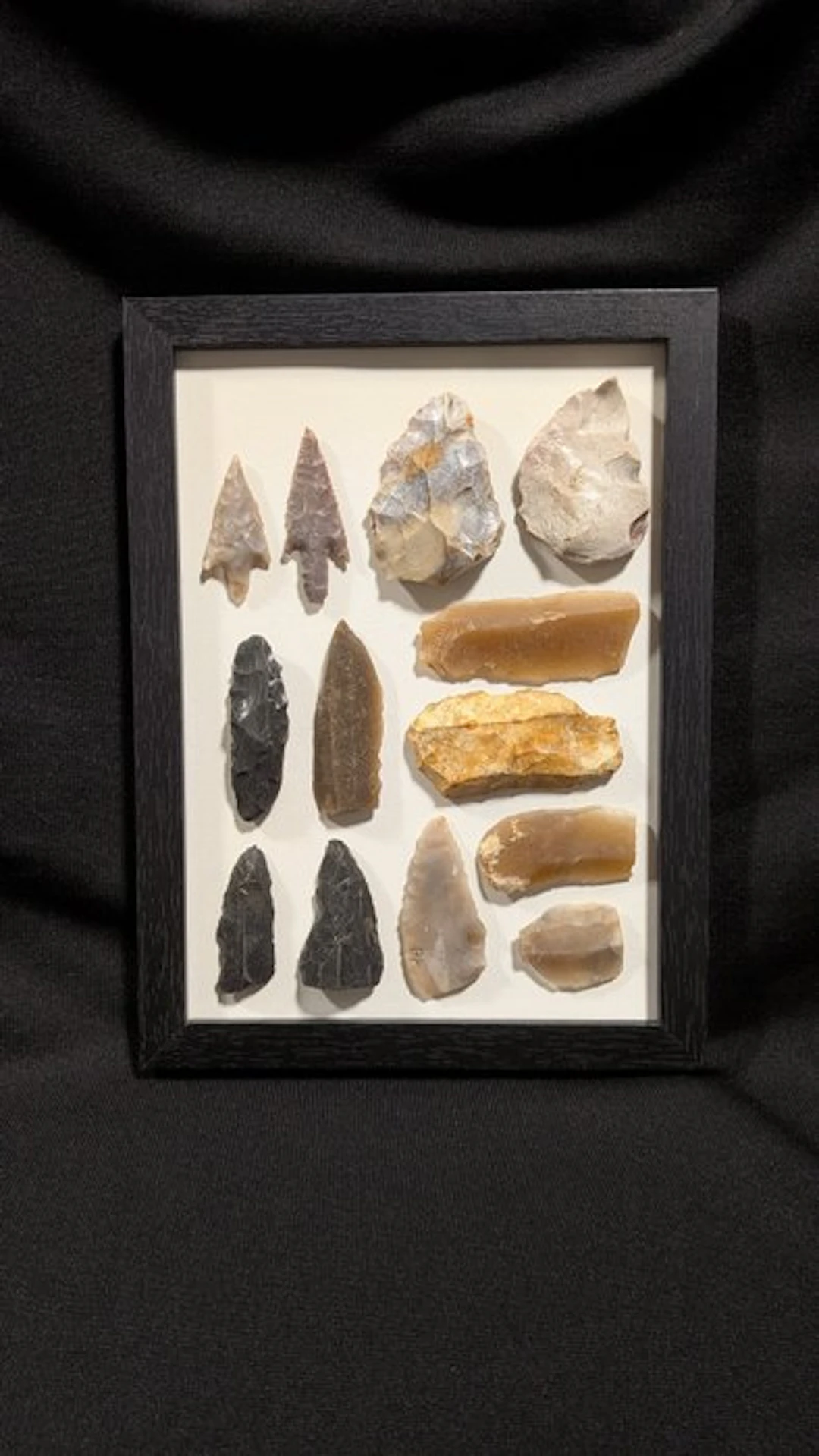 Paleolithic Flint Collection on a frame: bifacial arrowhead tools