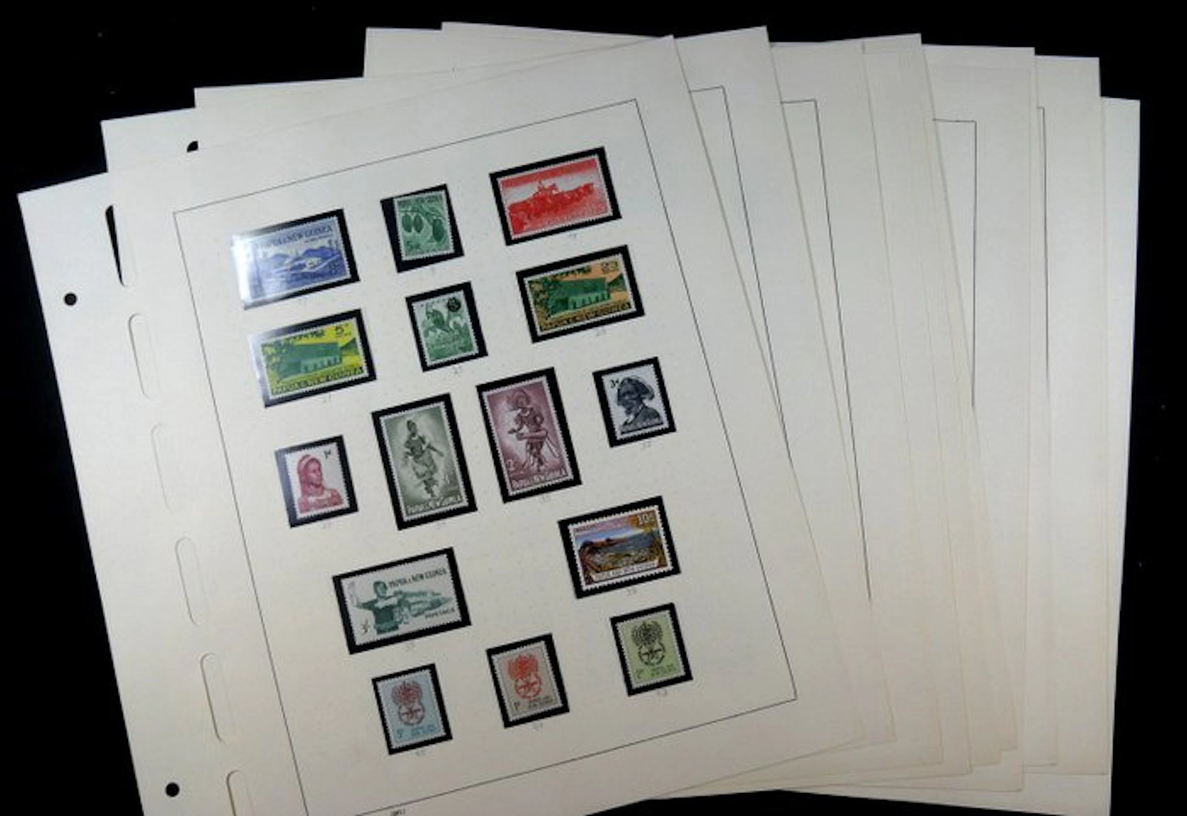 Papua New Guinea - Collection on album sheets