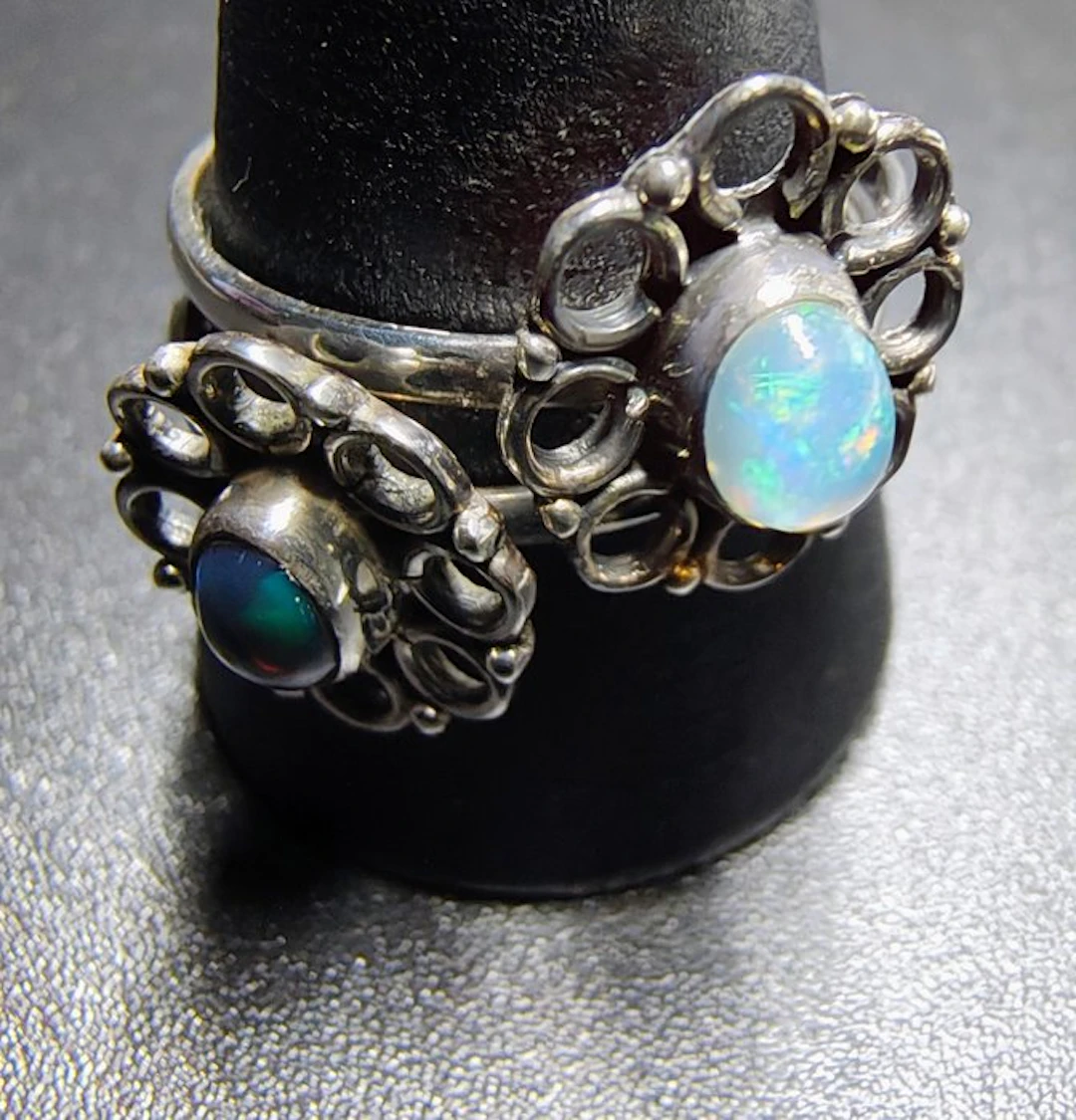 Pair of 925 silver rings with natural light and dark opal...