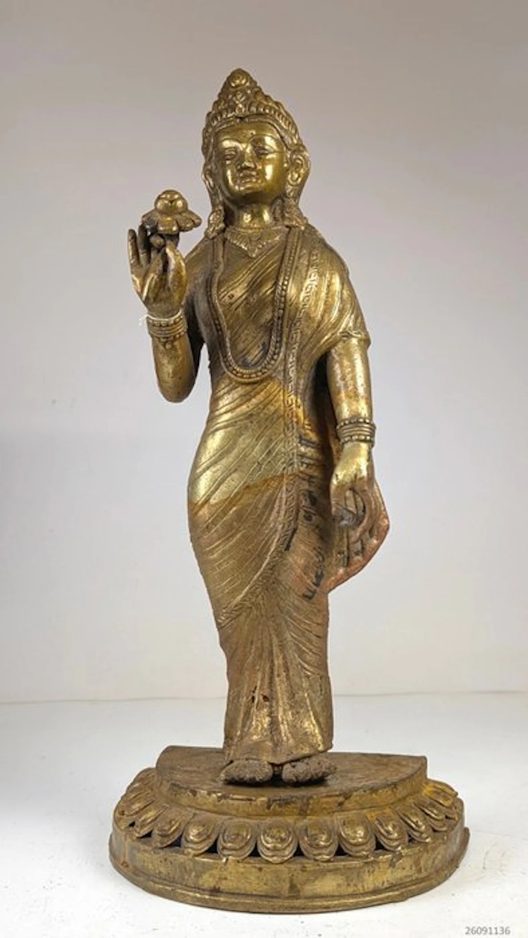 Bronze standing statue of the goddess Parvati on a lotus...