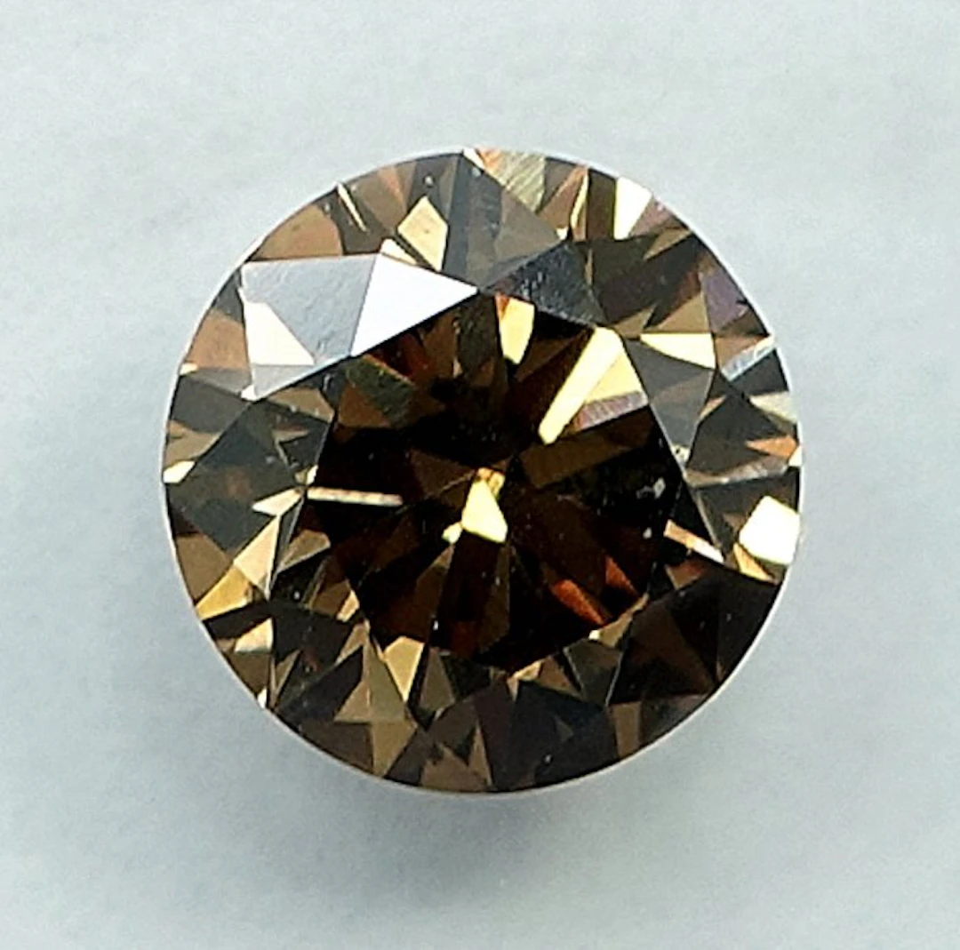 1 pcs Diamond (Natural coloured) - 0.69 ct - Round...