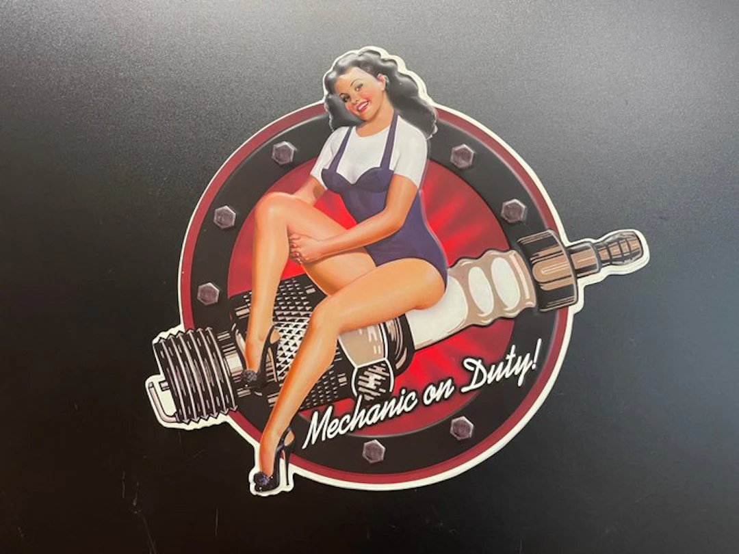 Mechanic Spark Plug Pin-Up Girl - Sign - Tin sign – embossed 'Made in USA'