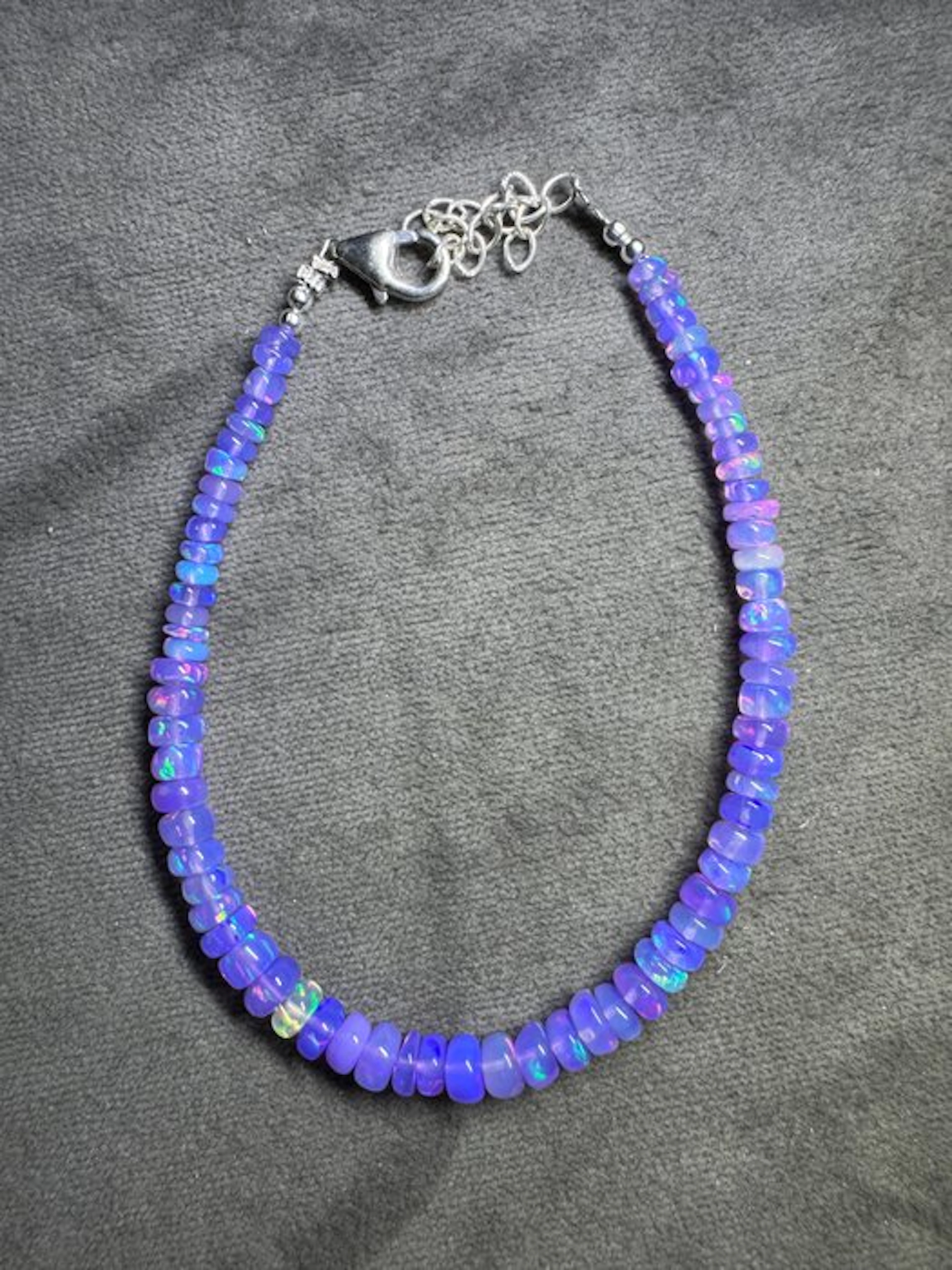 Bracelet of natural violet opals