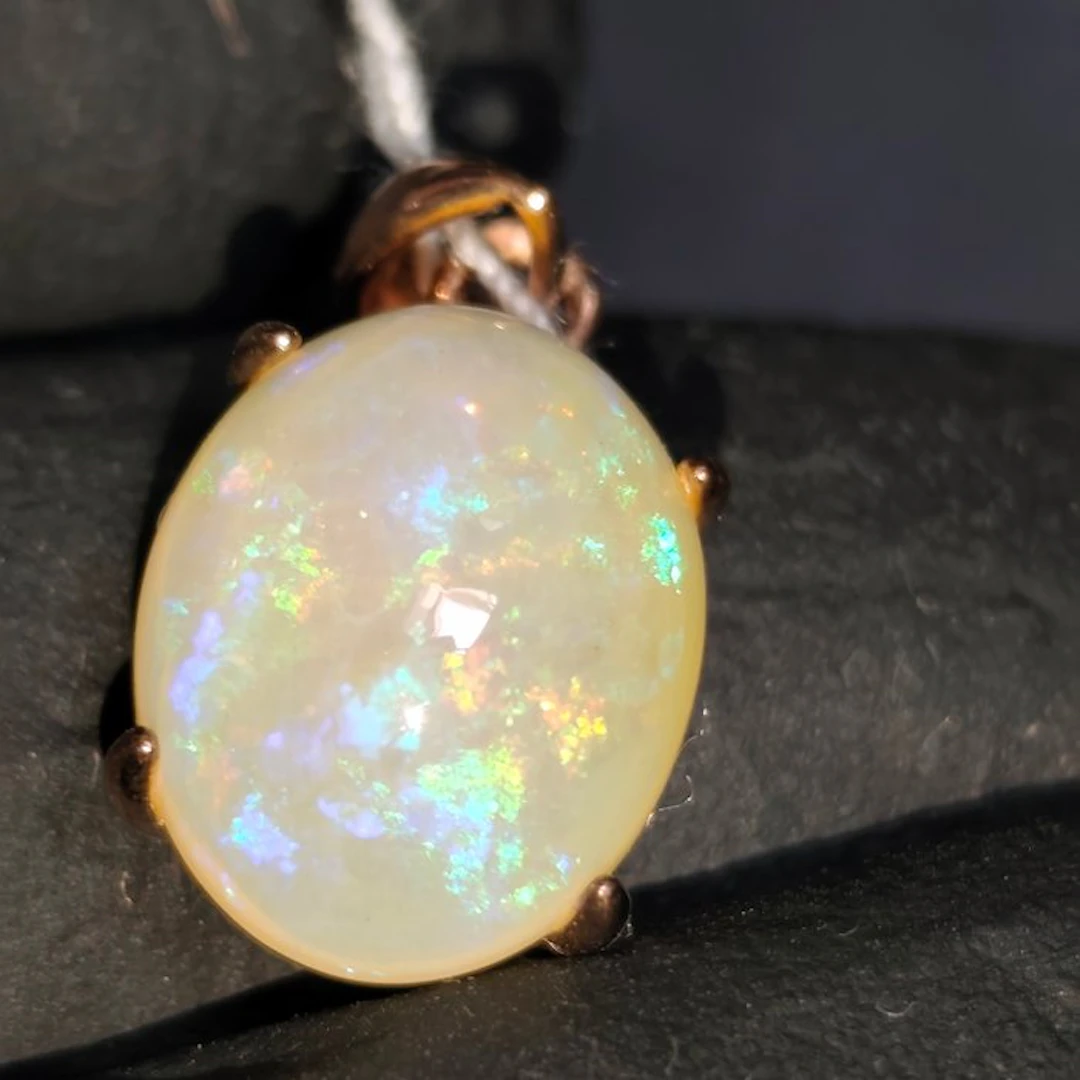 S925 silver pendant with Welo opal and rainbow arc...