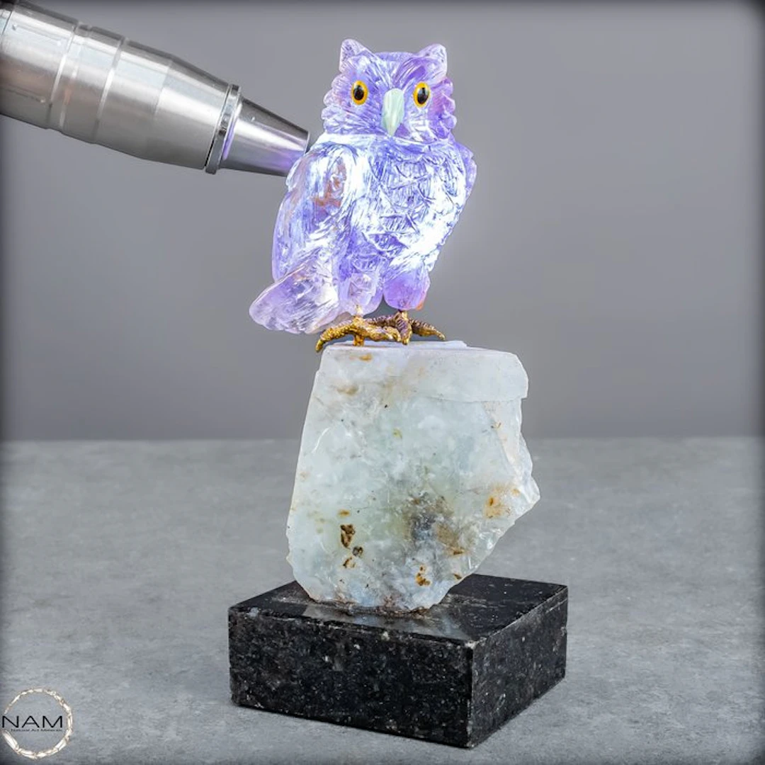 Artful clear amethyst owl Andean Opal- 440.44 g