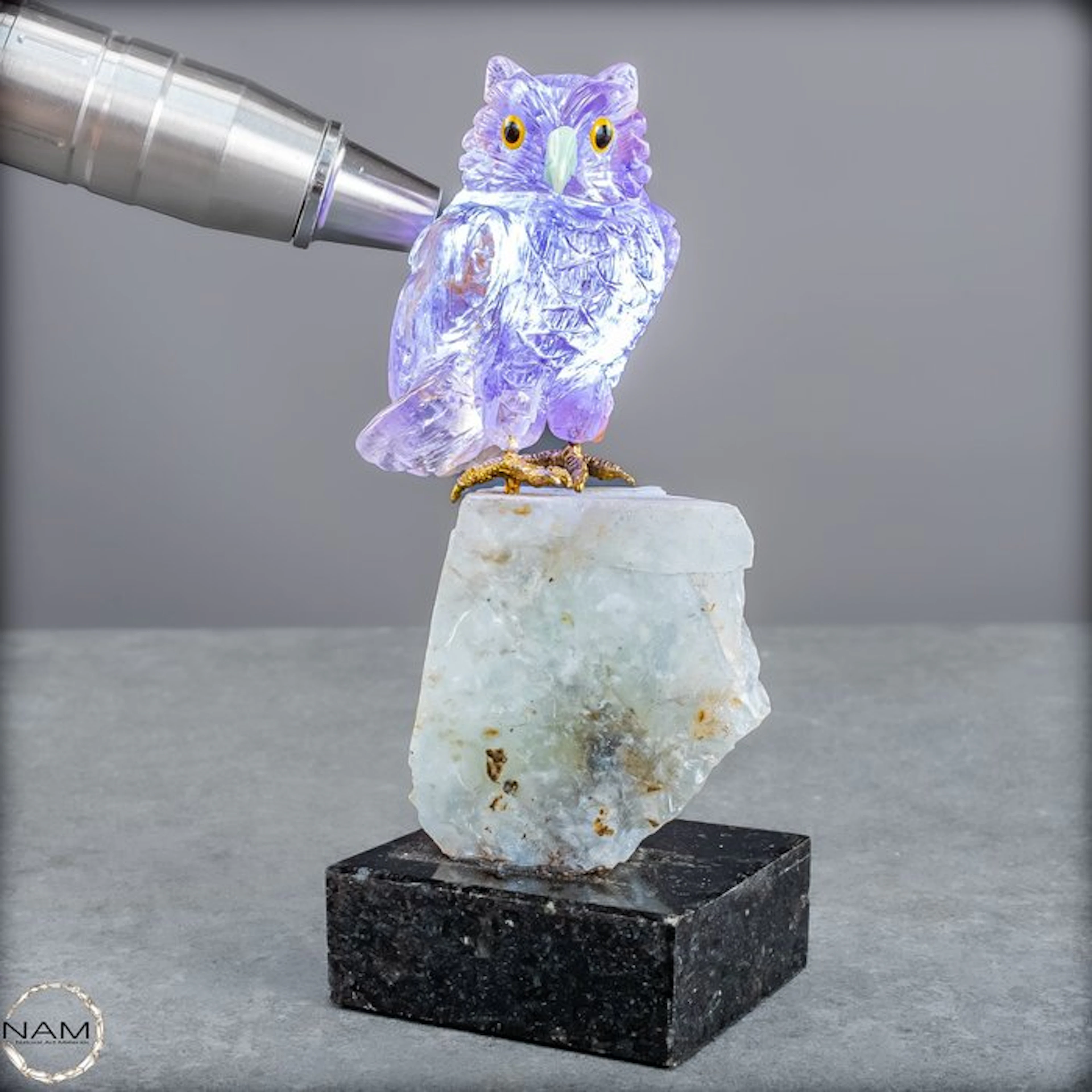 Artful clear amethyst owl Andean Opal- 440.44 g