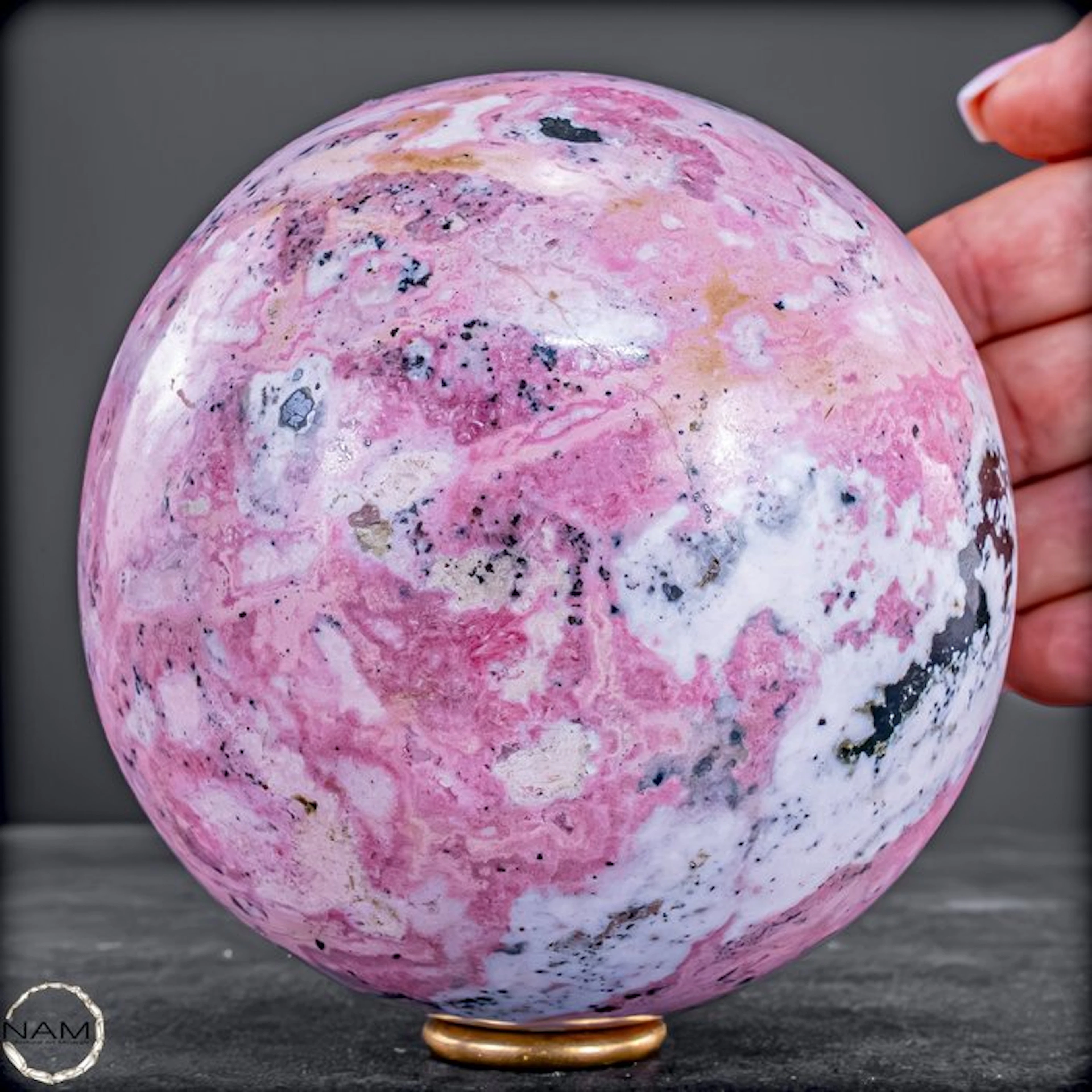 Natural rhodochrosite sphere – delicate rosé with a...