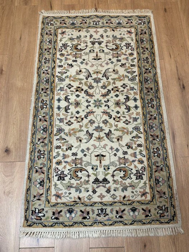 Hand-knotted Oriental rug in Nain-style with an elegant floral design