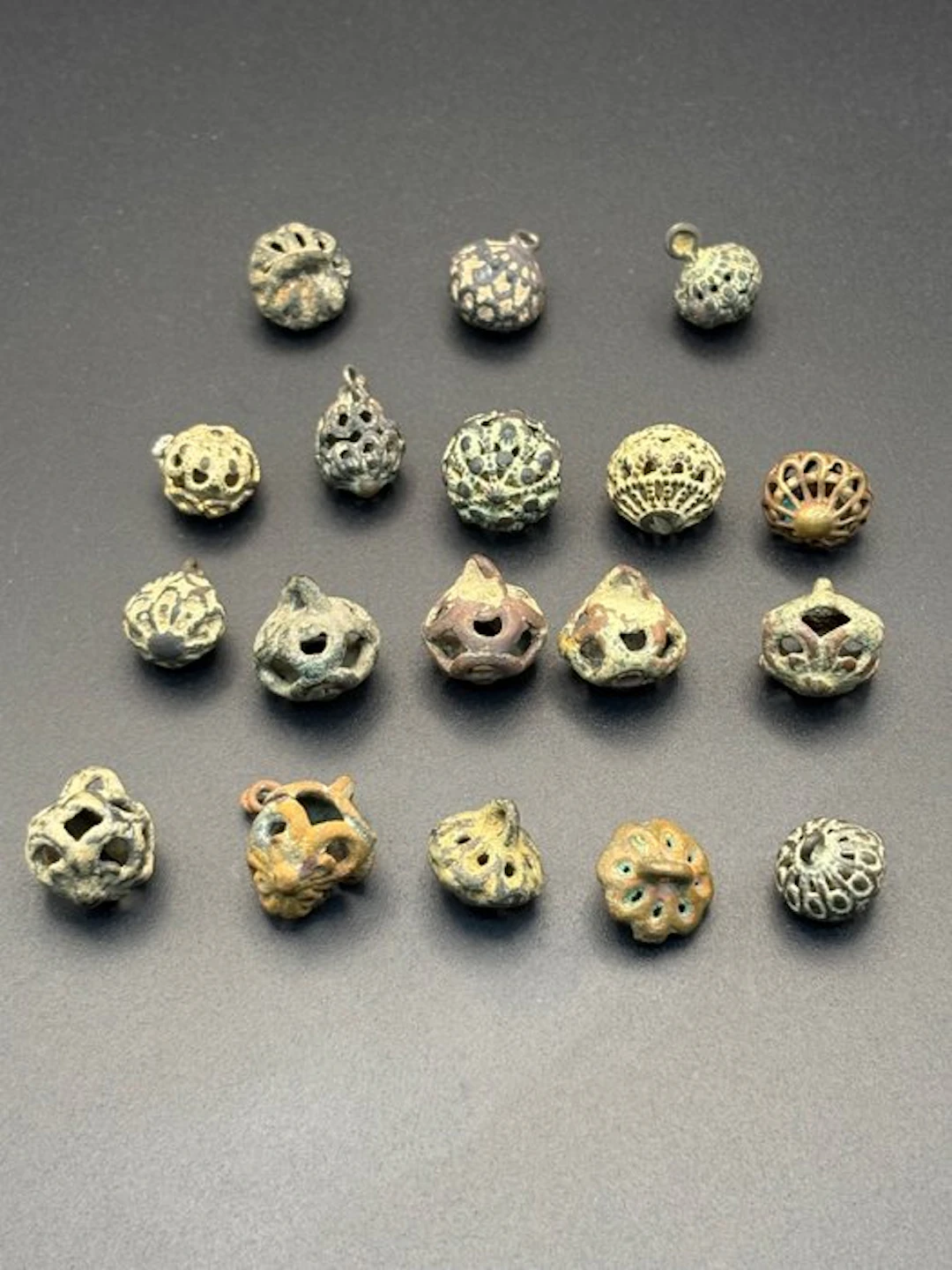 Medieval Bronze Lot of 18 bells and ornamental pendants
