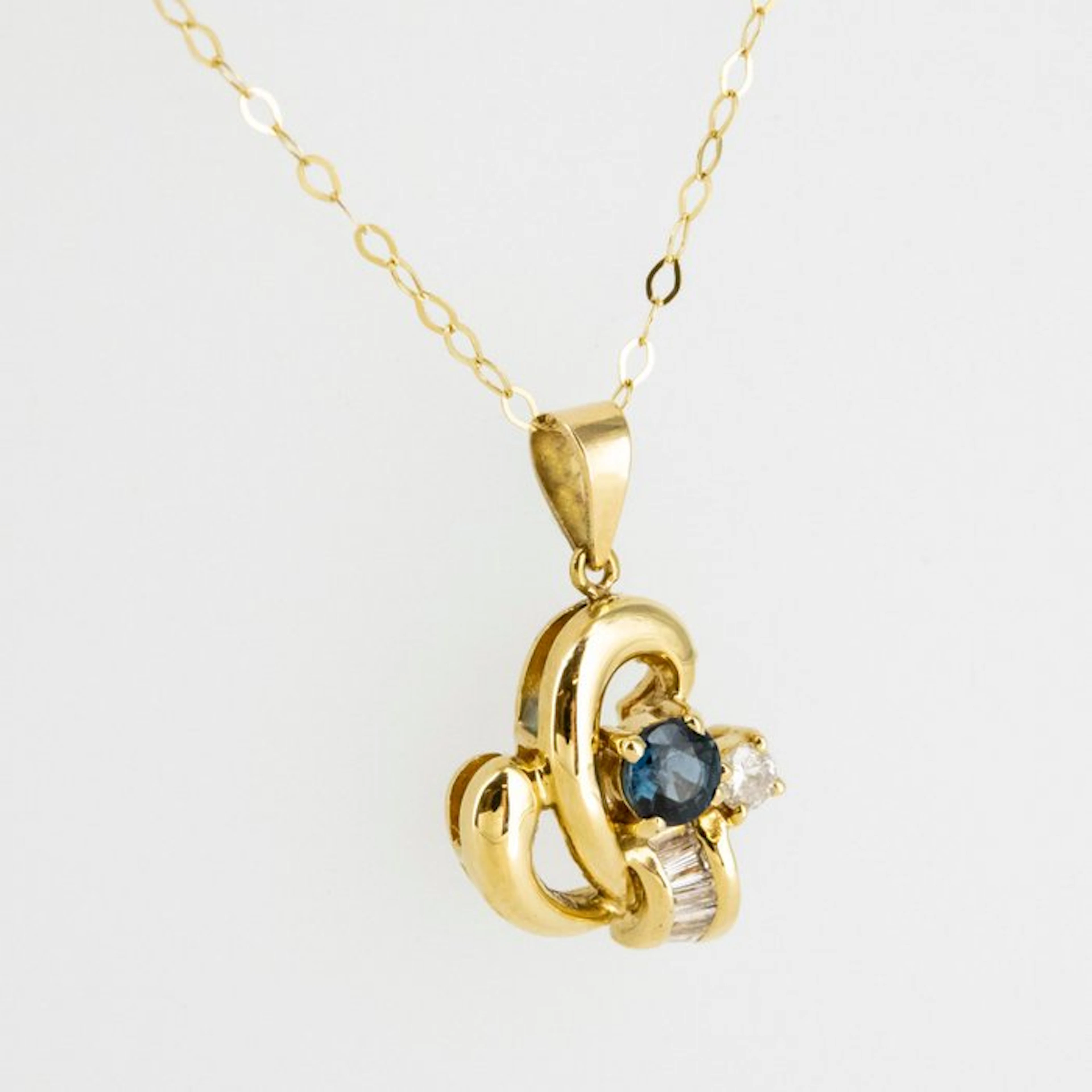 Pendant - 18 kt. Yellow gold - 0.50ct. tw. Sapphire - Diamond
