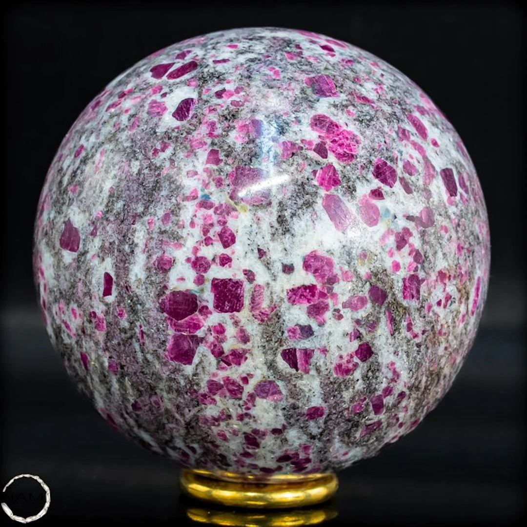 Ruby sphere in the matrix rock – UV-reactive gemstone with intense fluorescence