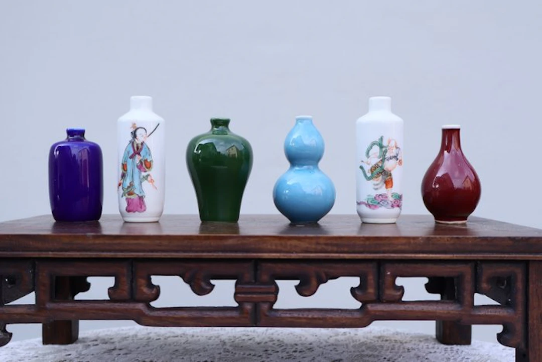 A Collection of Six Chinese Miniature Porcelain Vases and...