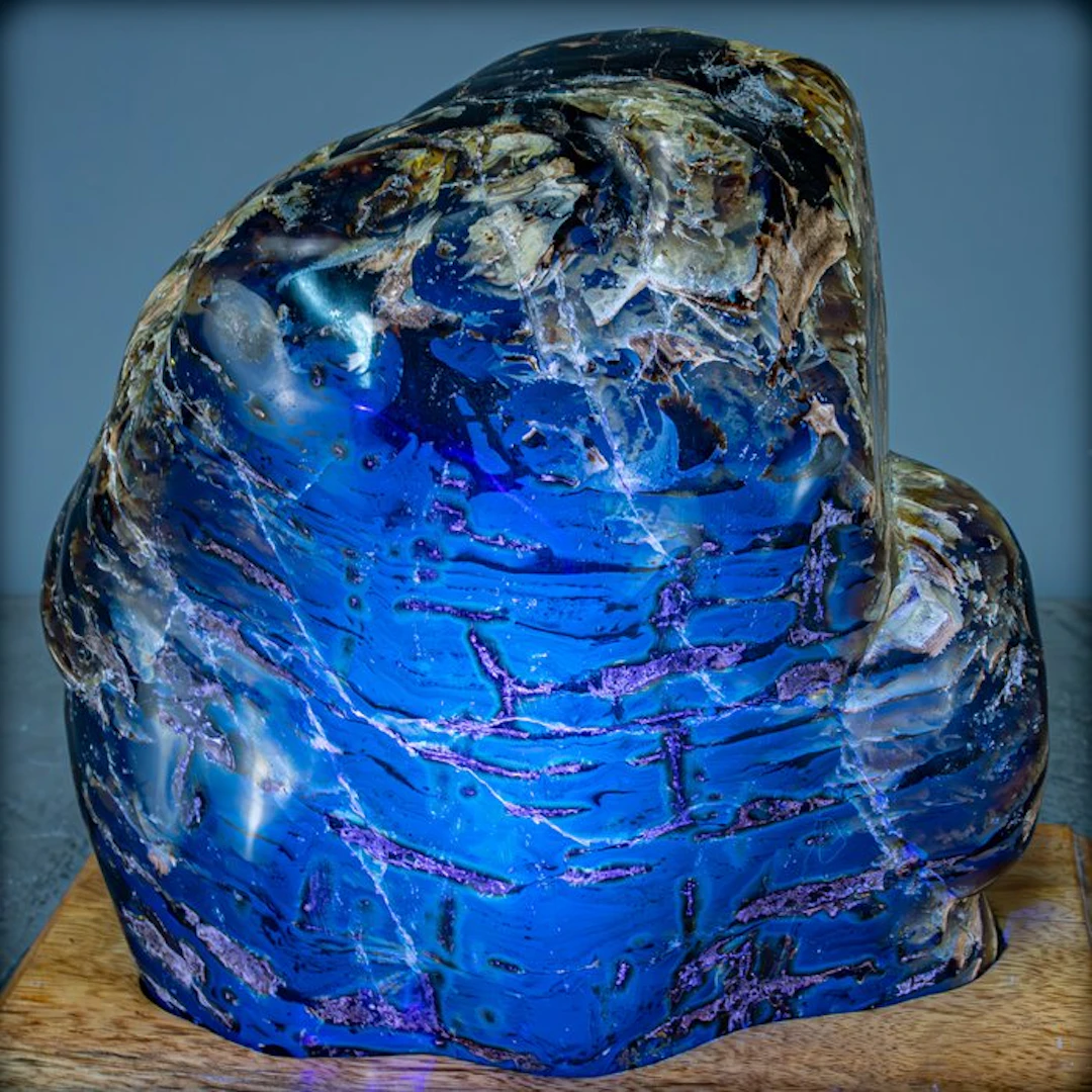 Amazing Natural Red / Blue Amber Freeform on Stand- 3591.14 g