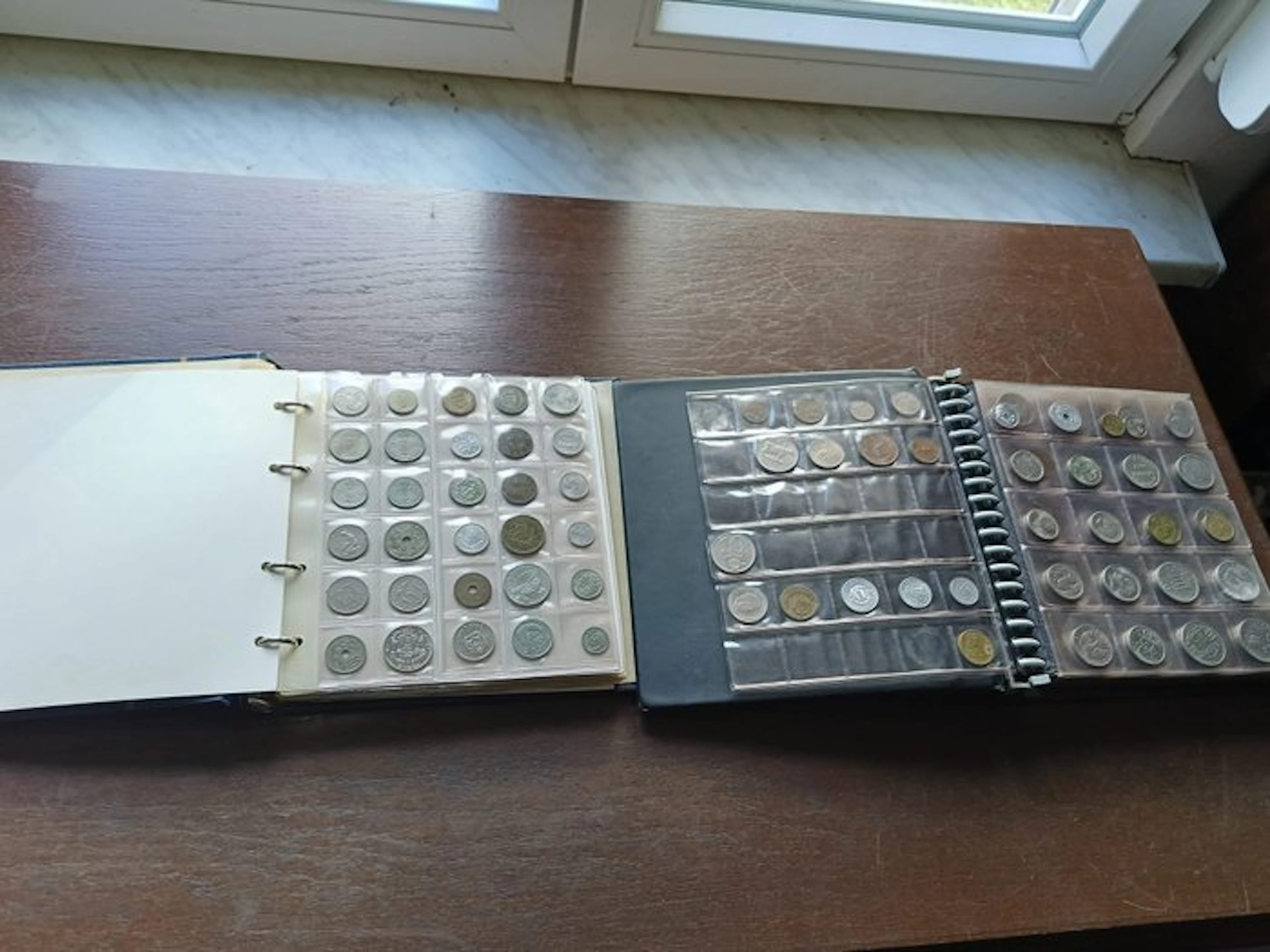 World. 2 x Album with veriaus intresting world Coins (No reserve price)