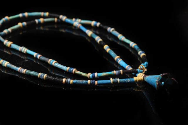 Ancient Egypt, Faience necklace with a lotus flower amulet - 31 cm