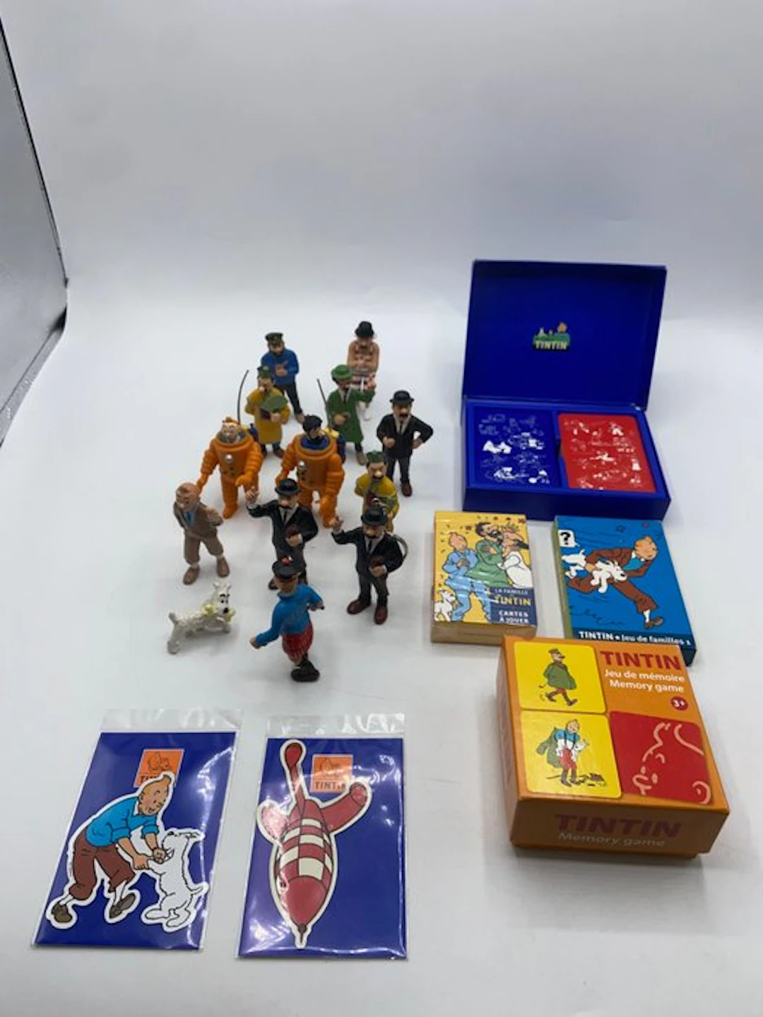 Moulinsart - Tintin - Grand lot de collection – 14 figurines + jeux de cartes