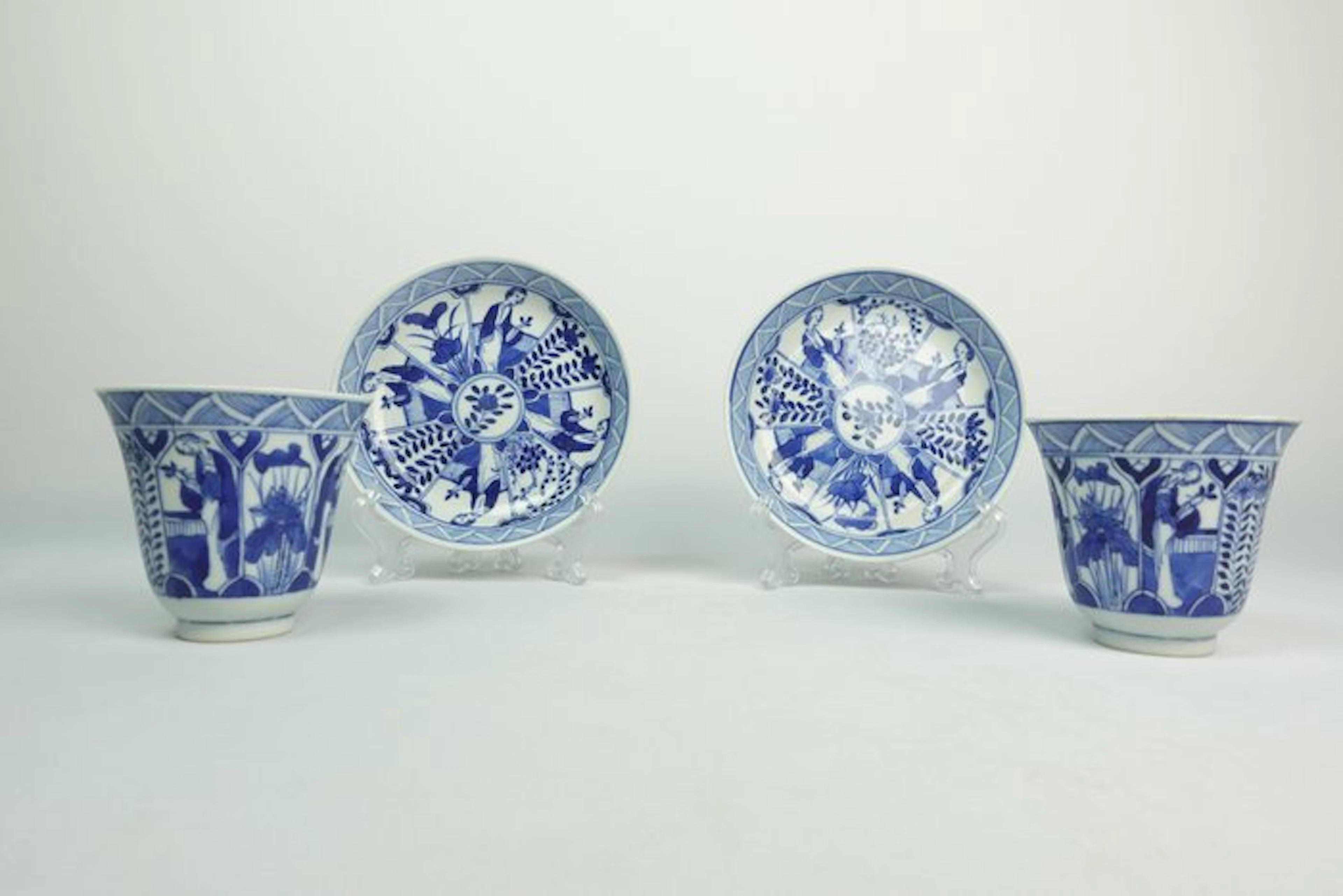 Two Sets Blue-and-White 'Four Beauties' Bell Cups...