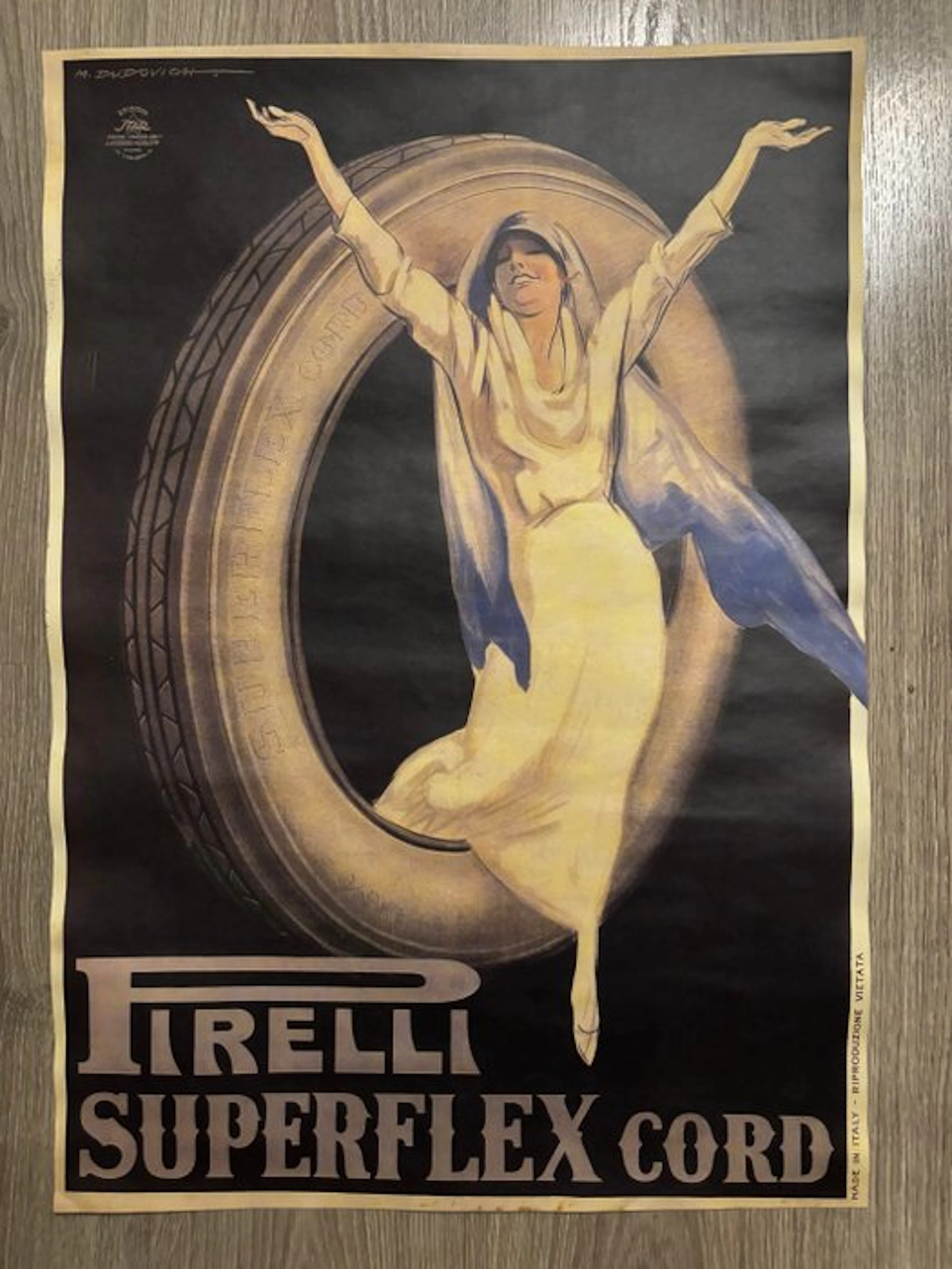 Marcello Dudovich - Manifesto pubblicitario Pirelli Superflex Cord - 1970s