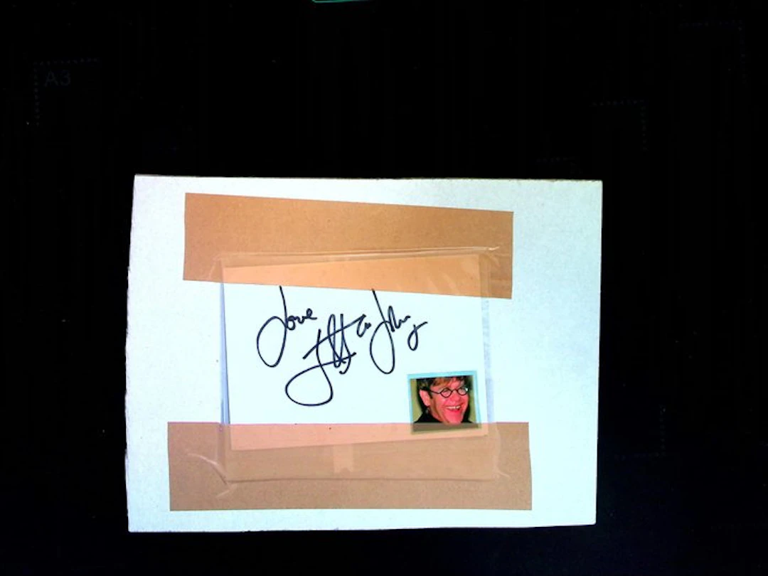 Elton John - Photo on card with signature - Hand signed in person