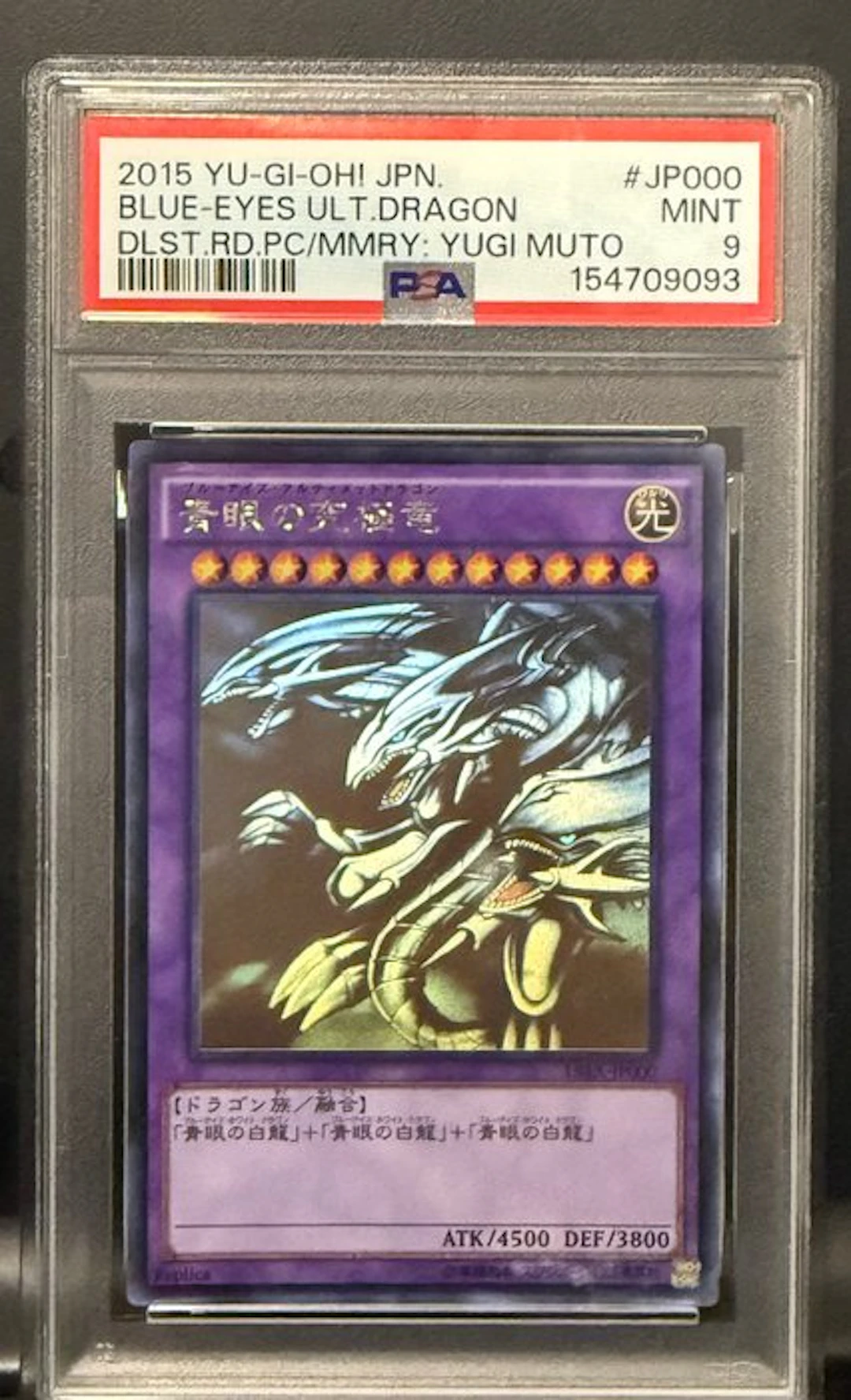 Konami - 1 Graded card - Yu-Gi-Oh! - Blue-Eyes Ultimate Dragon #JP000 - PSA 9