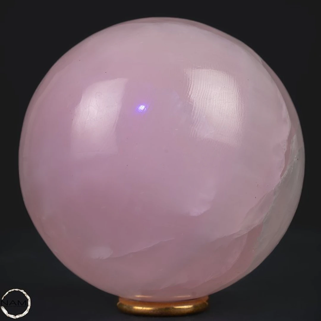 Natural aragonite sphere in soft pink with intense UV fluorescence- 723.84 g